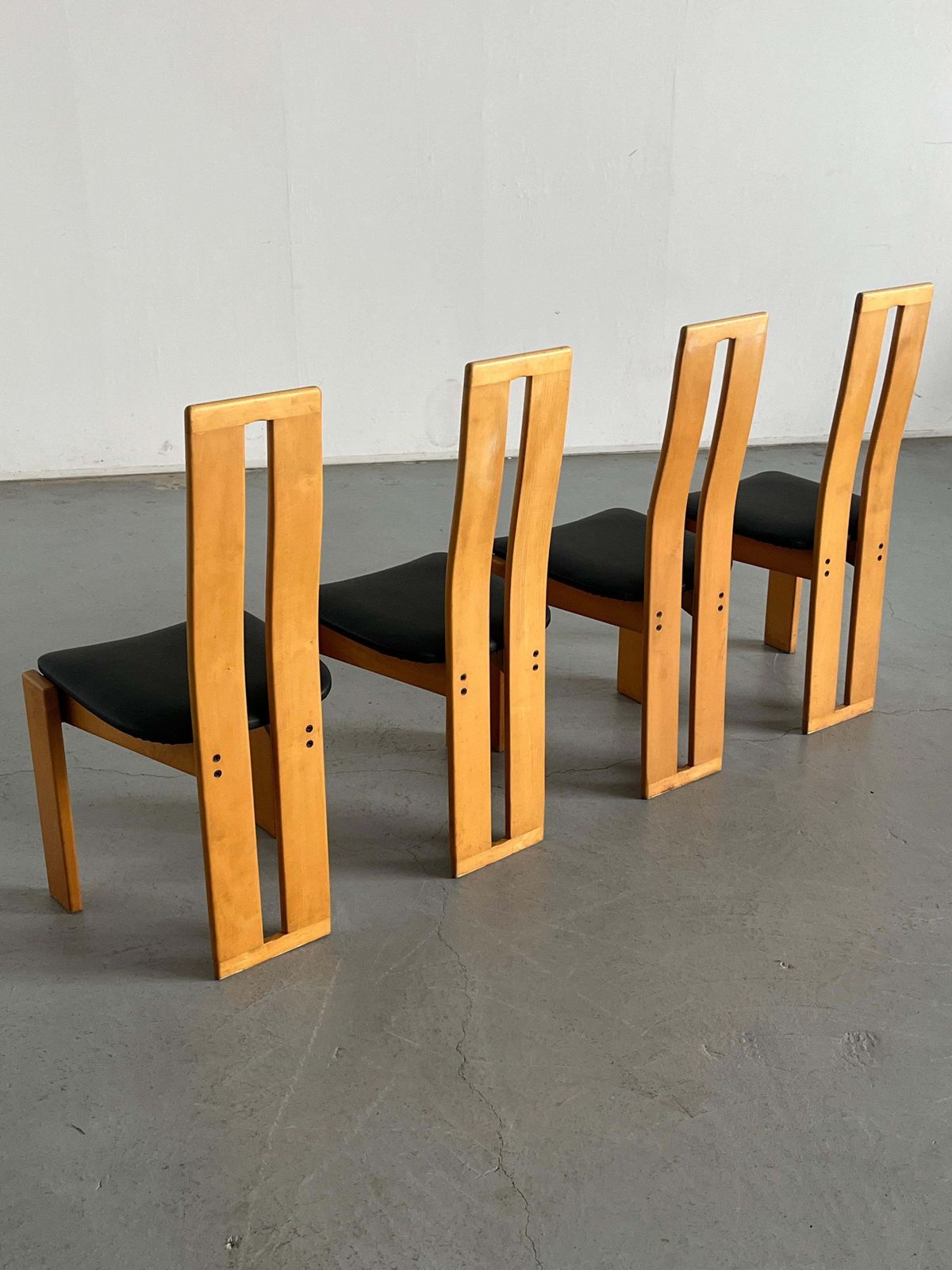 Set Of Four High Back Dining Chairs In Beechwood And Black Faux Leather, 1970s photo vinterior