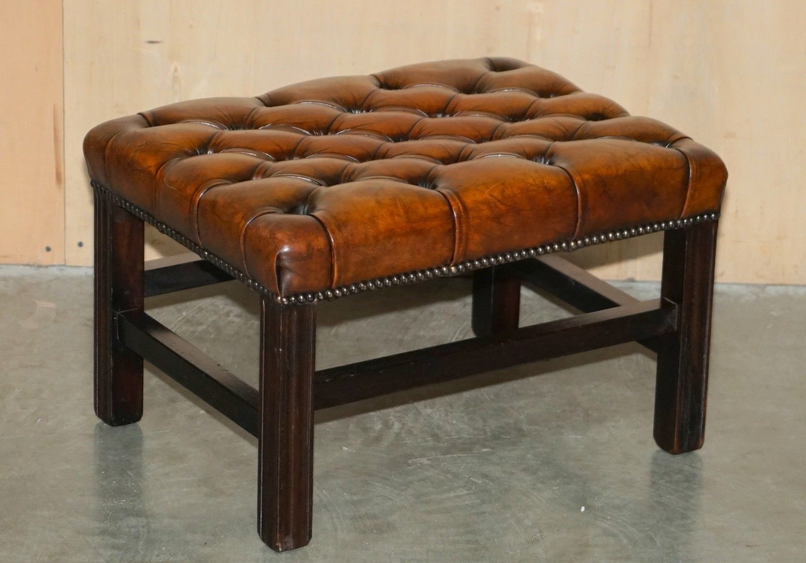 Pair Of Restored Vintage Hand Dyed Brown Leather Chesterfield Tufted Footstools photo for sale