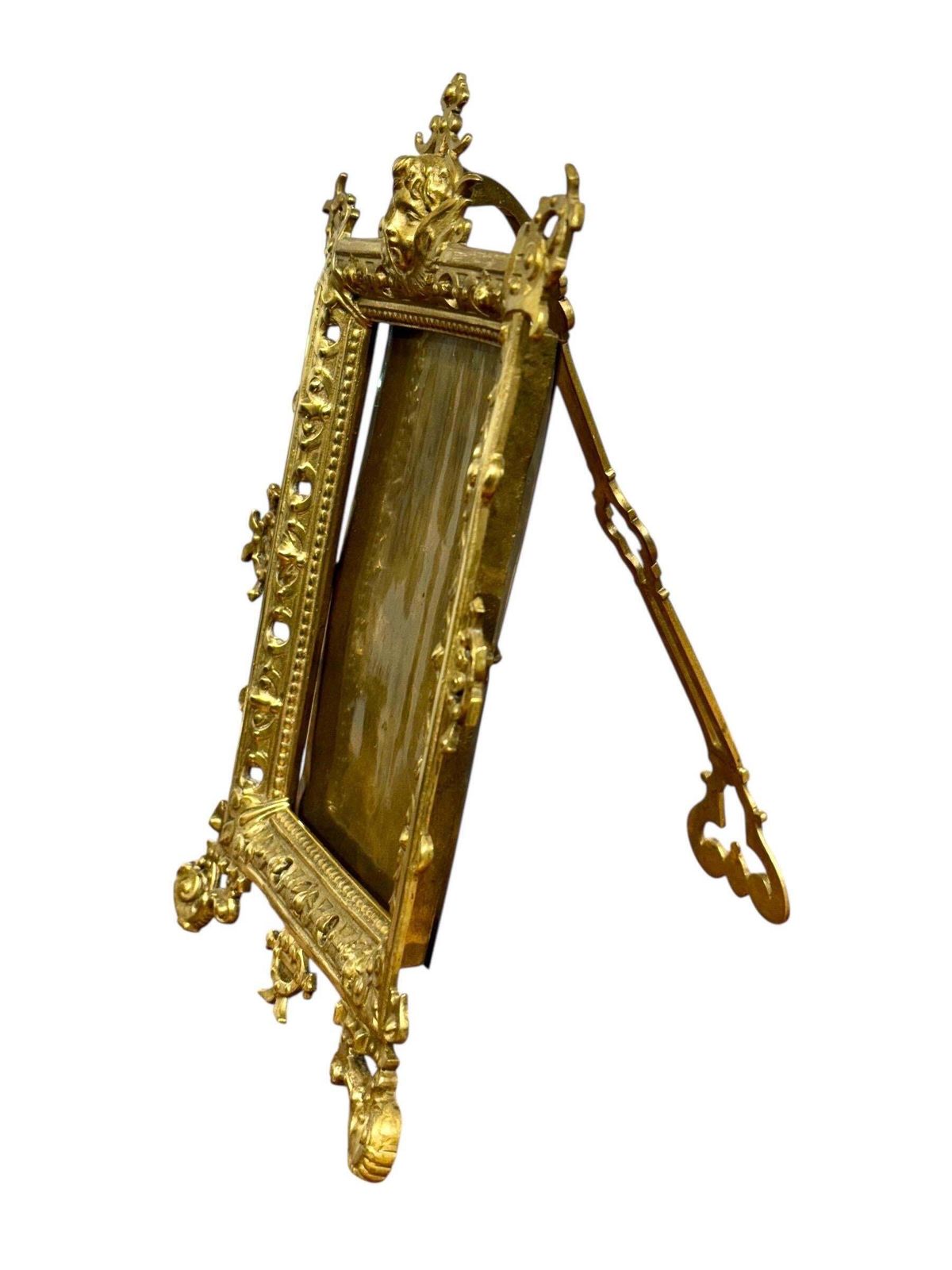 Ornate 19th Century Gilt Bronze Tabletop Frame With Cherub Motif photo vinterior