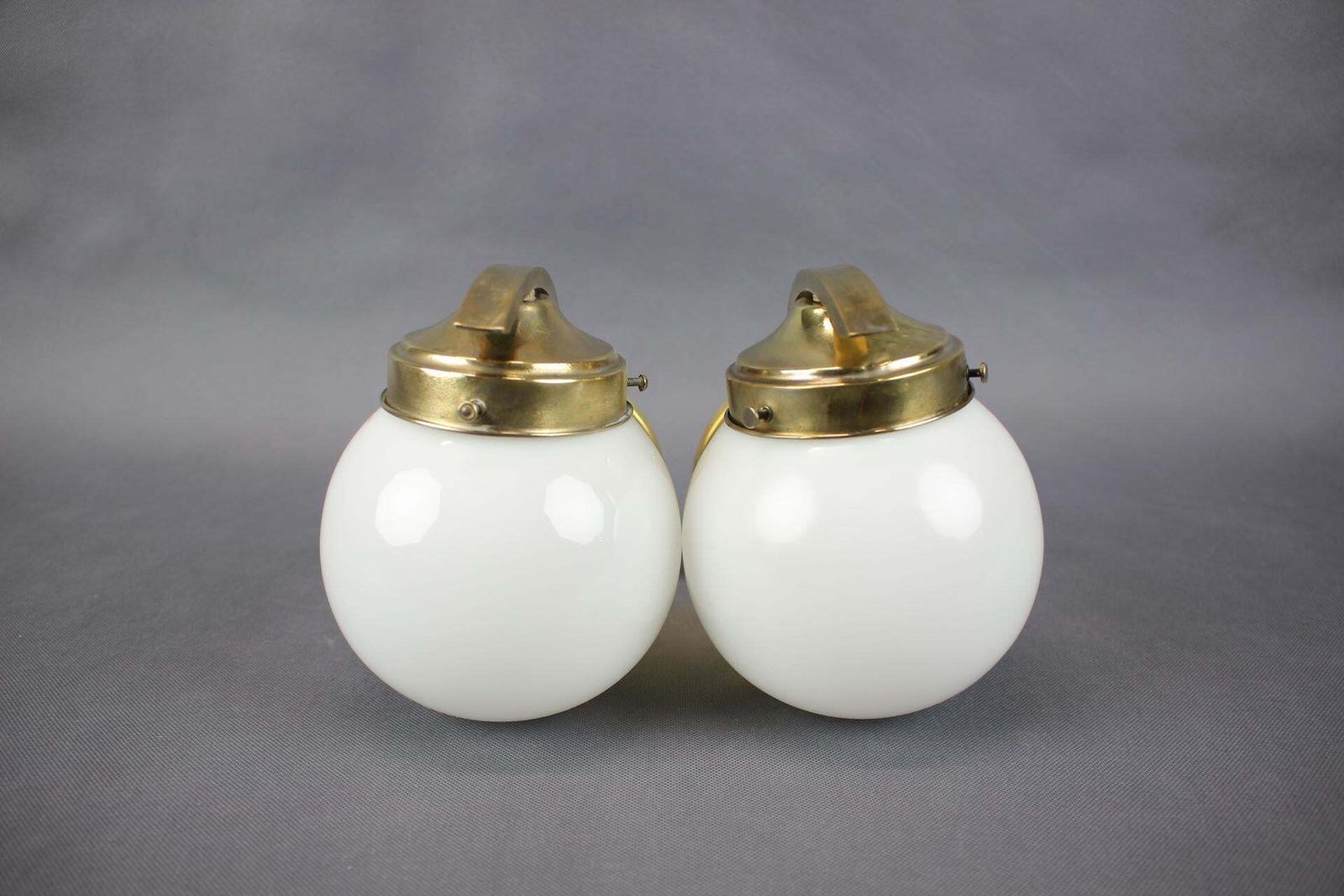 photo furniture Pair Of Art Deco Brass Wall Lamps With Opaline Glass, Europe, 1930s
