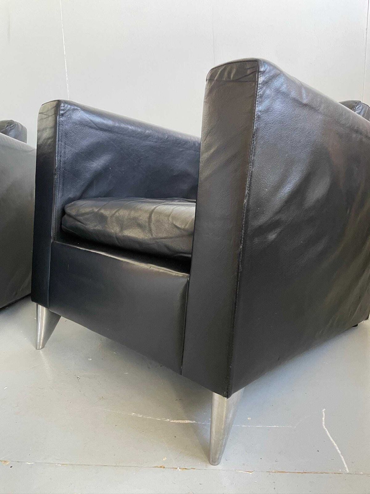 photo furniture Pair Of Philippe Starck ‘Niggelman’ Black Leather And Aluminium 80s Postmodern Armchairs