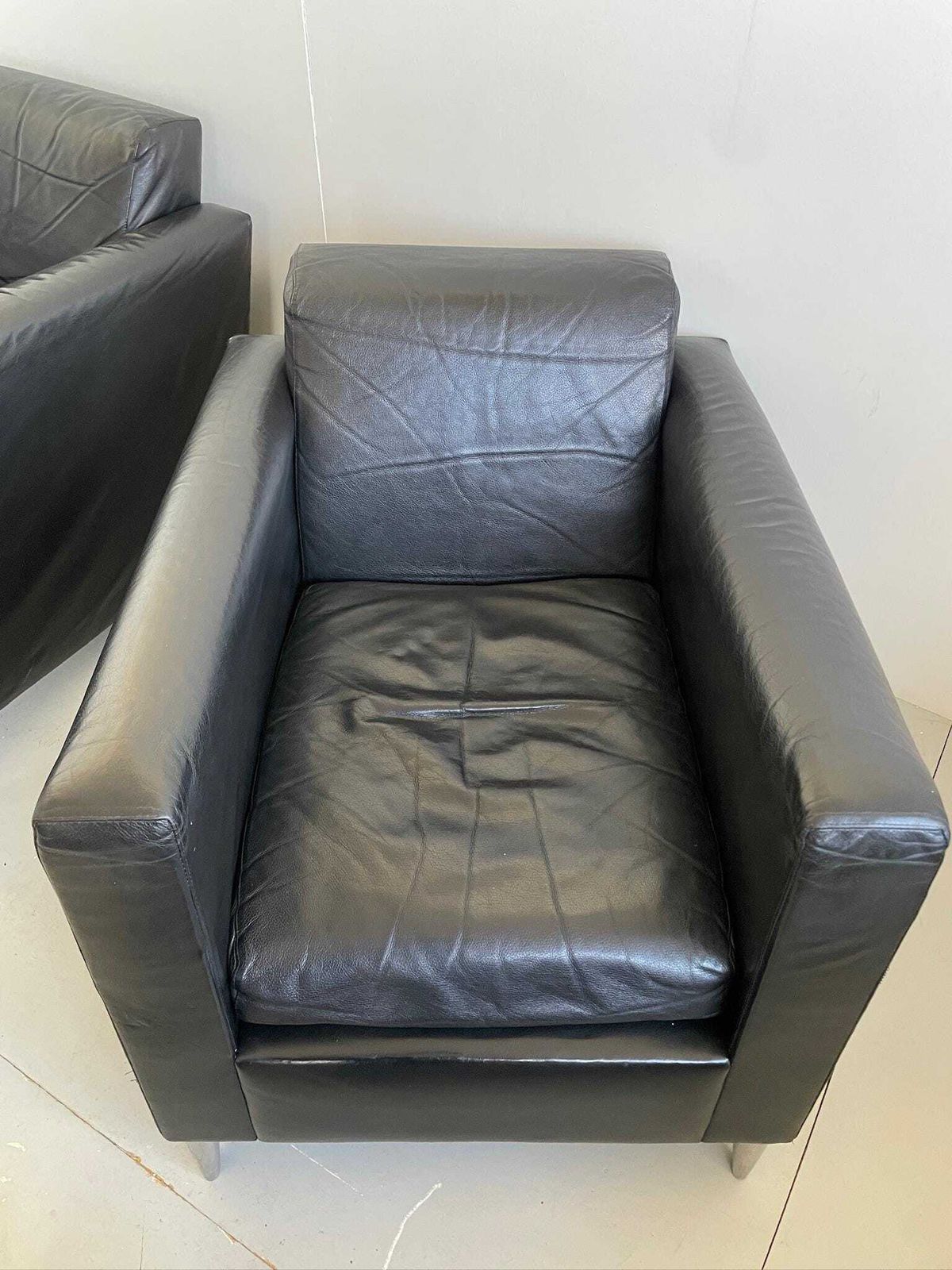 photo for sale Pair Of Philippe Starck ‘Niggelman’ Black Leather And Aluminium 80s Postmodern Armchairs