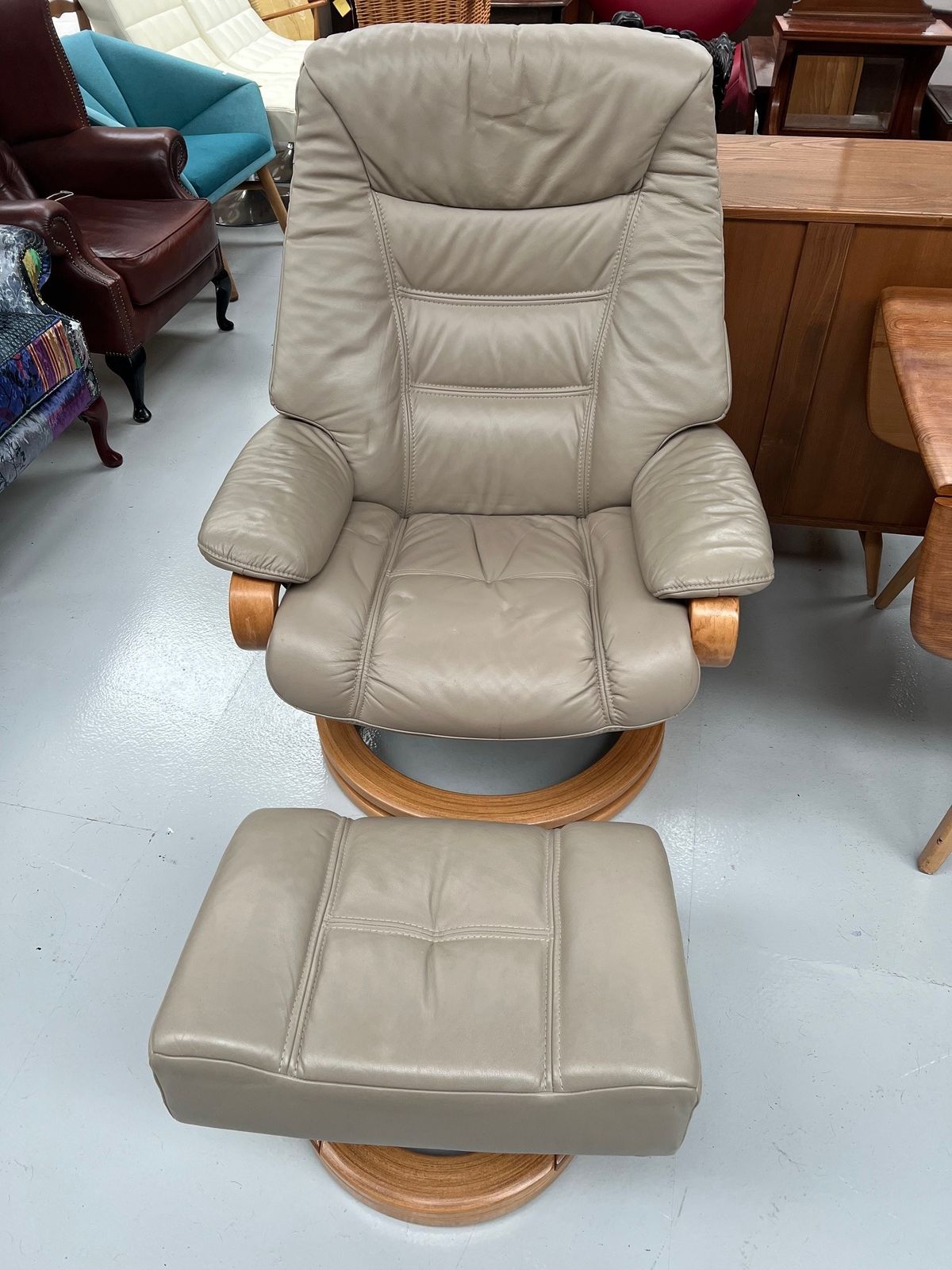 Stressless Beige Leather Swivel Recliner Chair And Stool