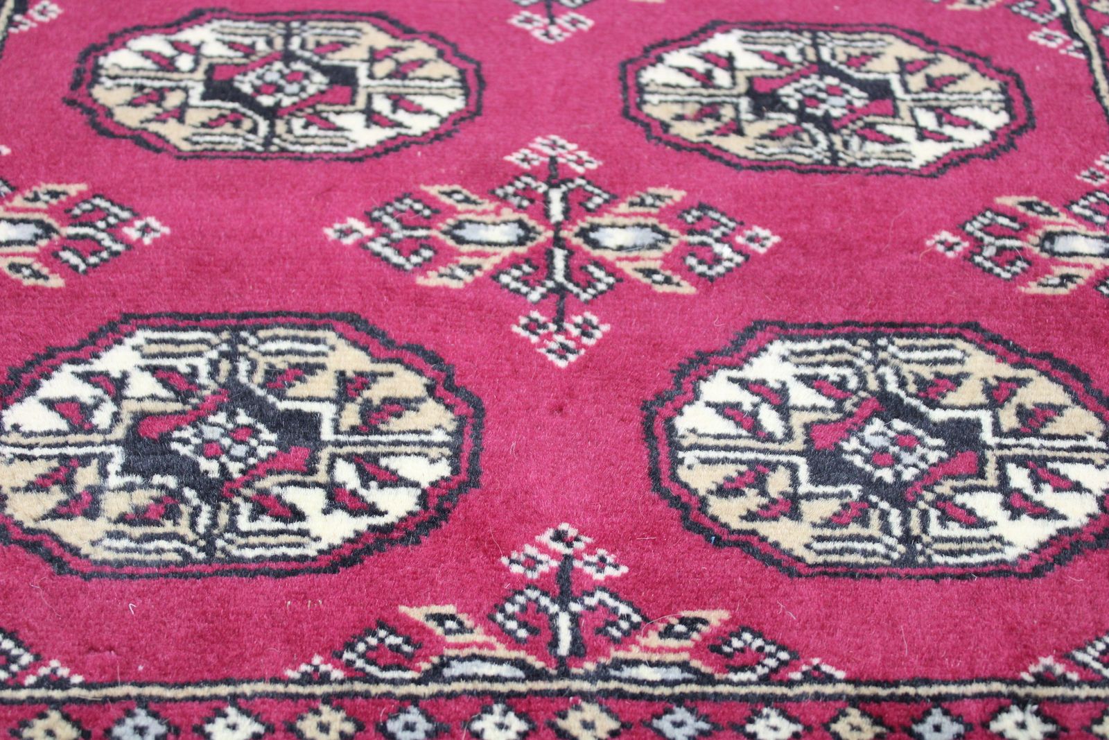 Red Tribal Bokhara Rug – Hand Knotted Geometric Carpet photo Textiles