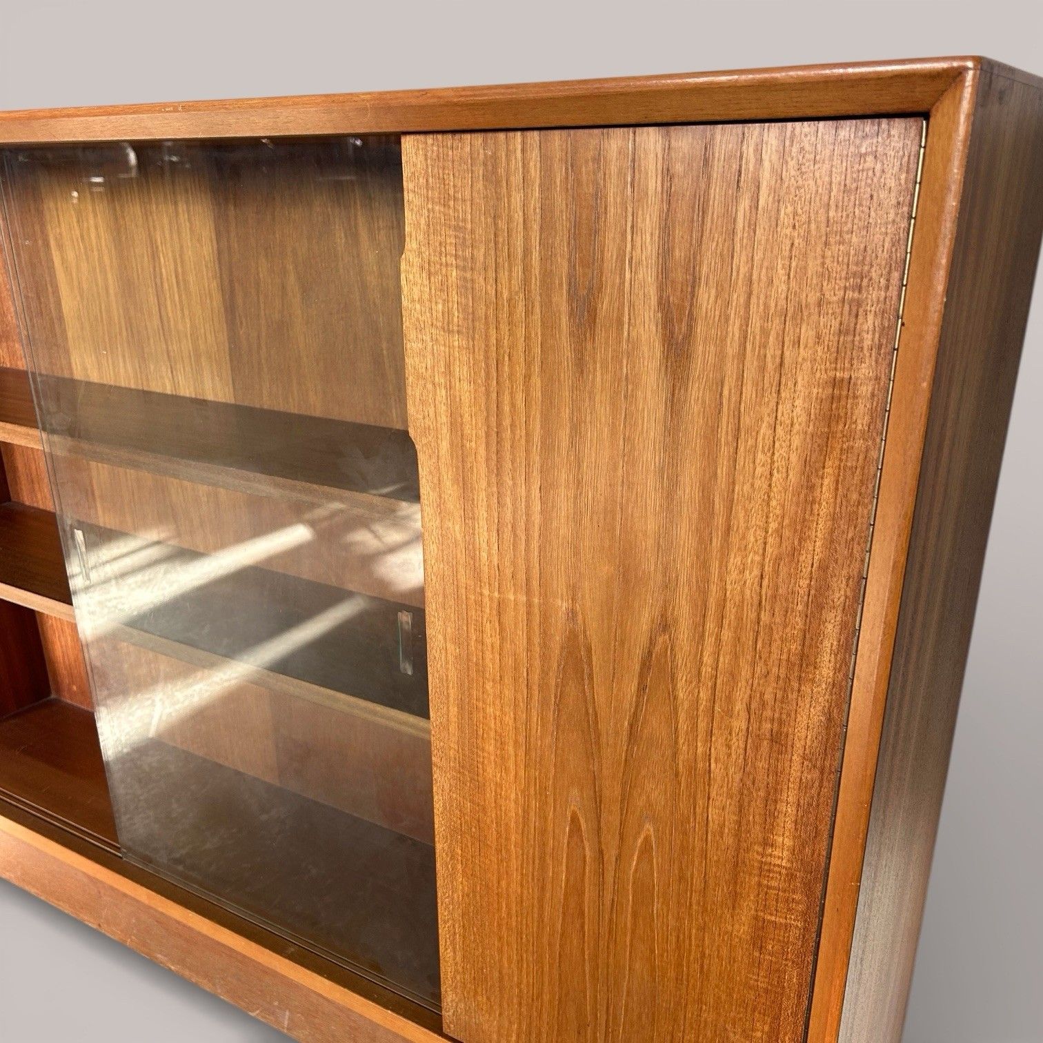 Mid Century Glazed Teak Bookcase With Cupboard – Gibbs photo for sale