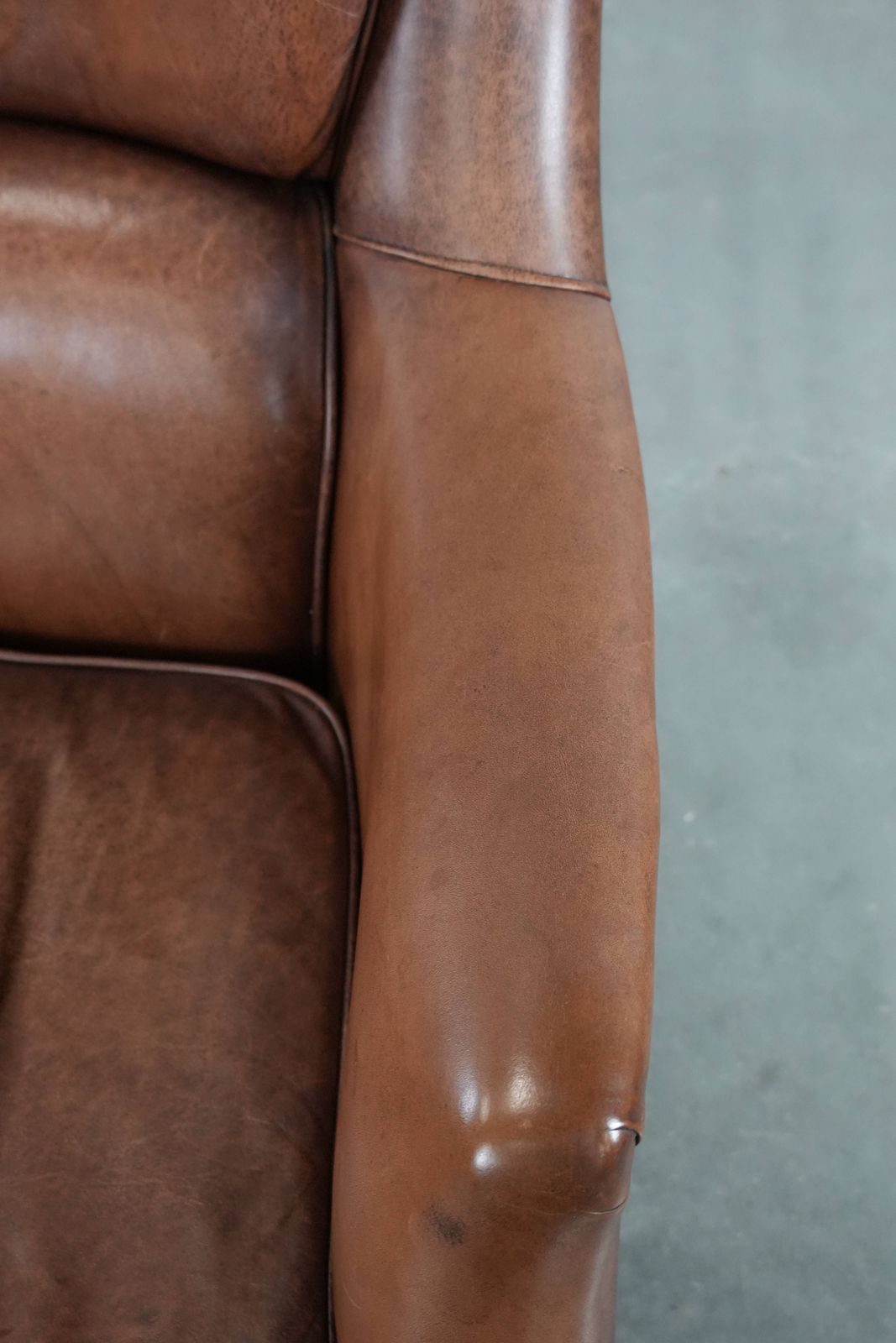 Very Comfortable And Luxurious Cognac Brown Cowhide Armchair With A Decorative Stud Finish photo vintage