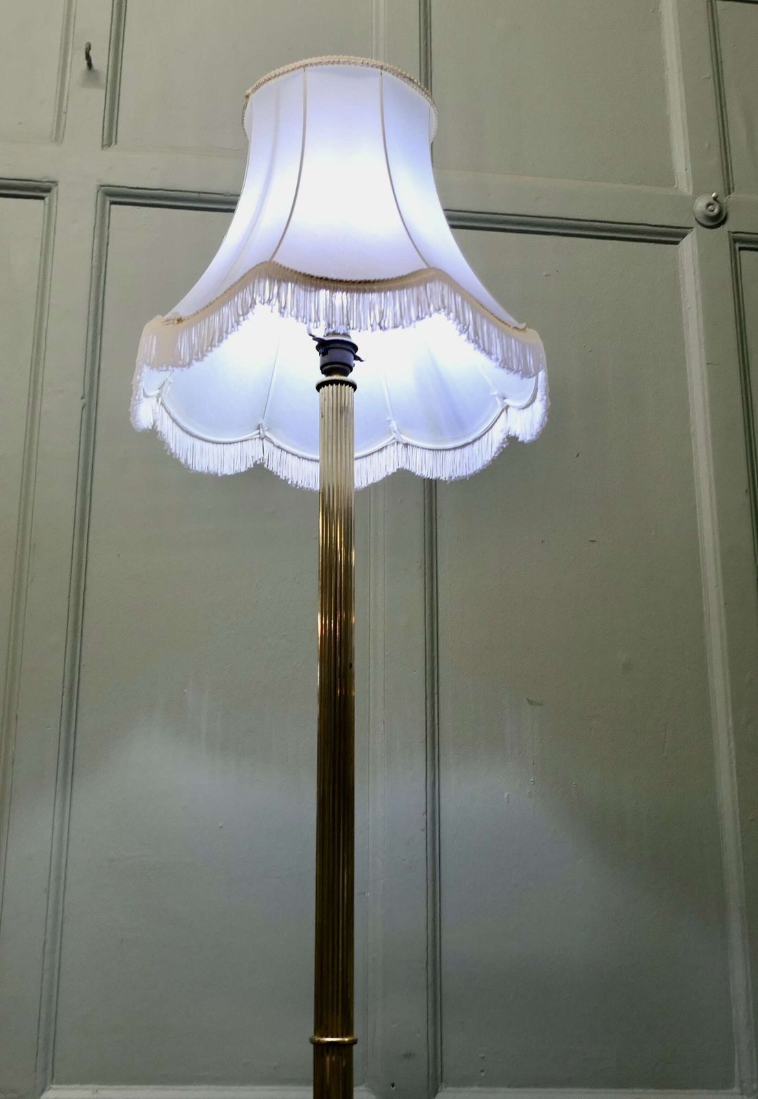 A Slender Column Brass Floor Lamp photo 660.0