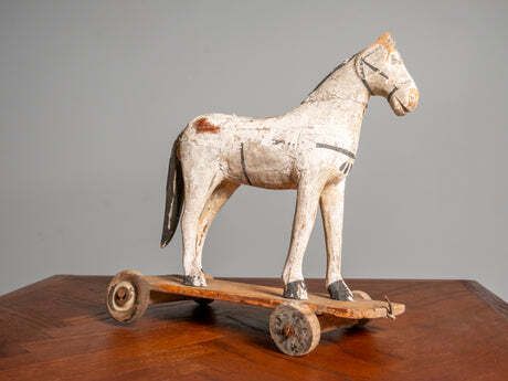 photo furniture Antique Wooden Toy Horse On Wheels, Early 20th Century