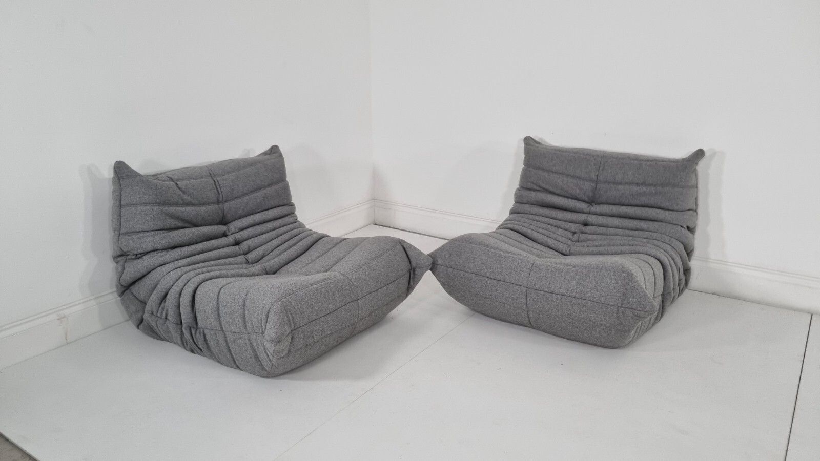 photo buy Ligne Roset Pair Of Togo Chairs In Grey Wool Immaculate