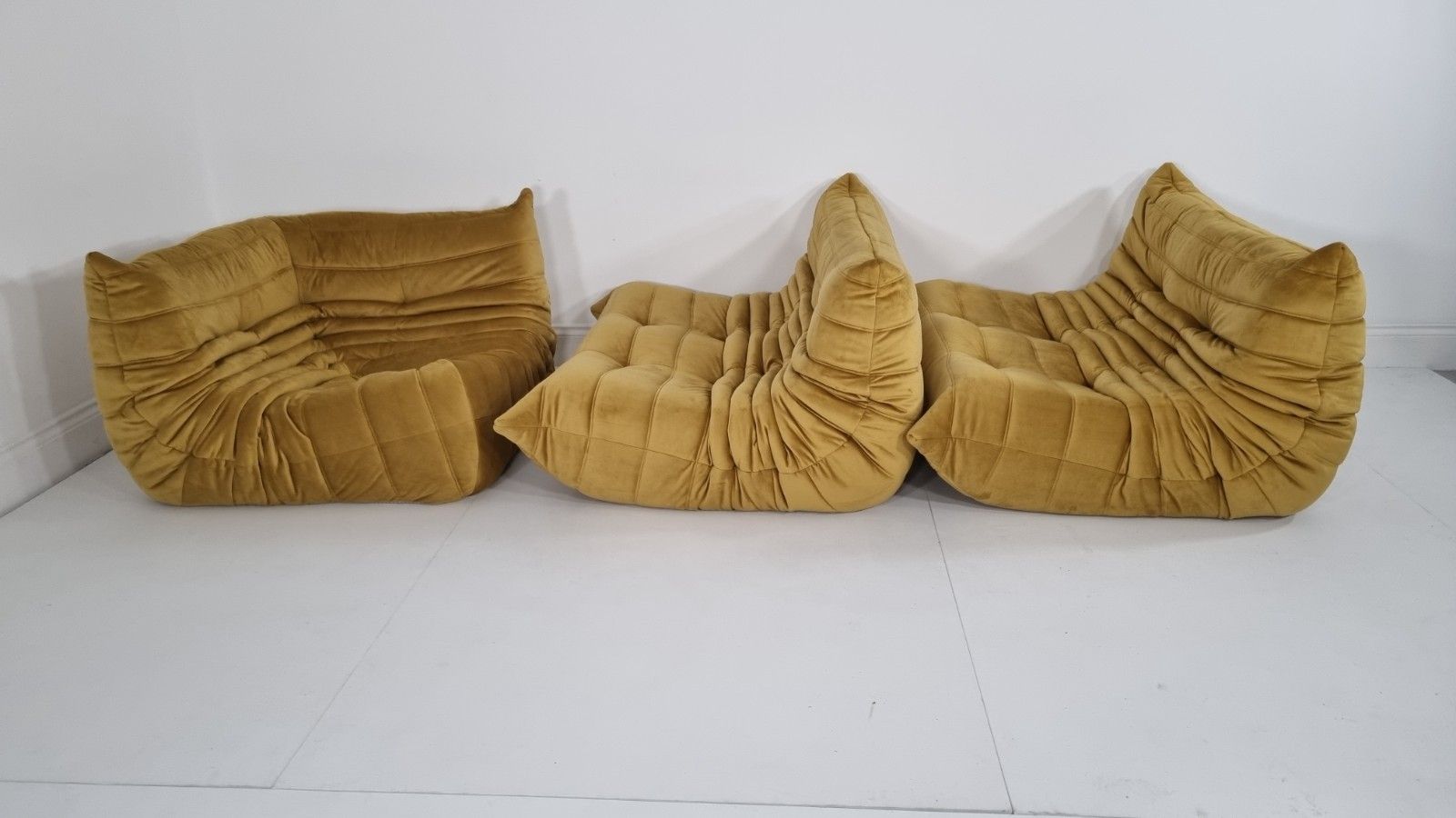 photo buy Ligne Roset Togo 2 X 2 Seater And Corner In Bronze Gold Velvet