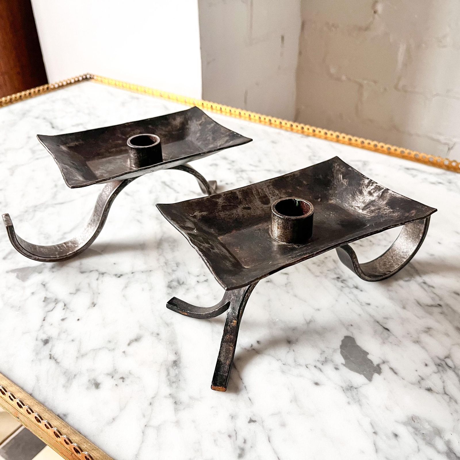 A Pair Of Brutalist Mid Century Wrought Iron Candlesticks