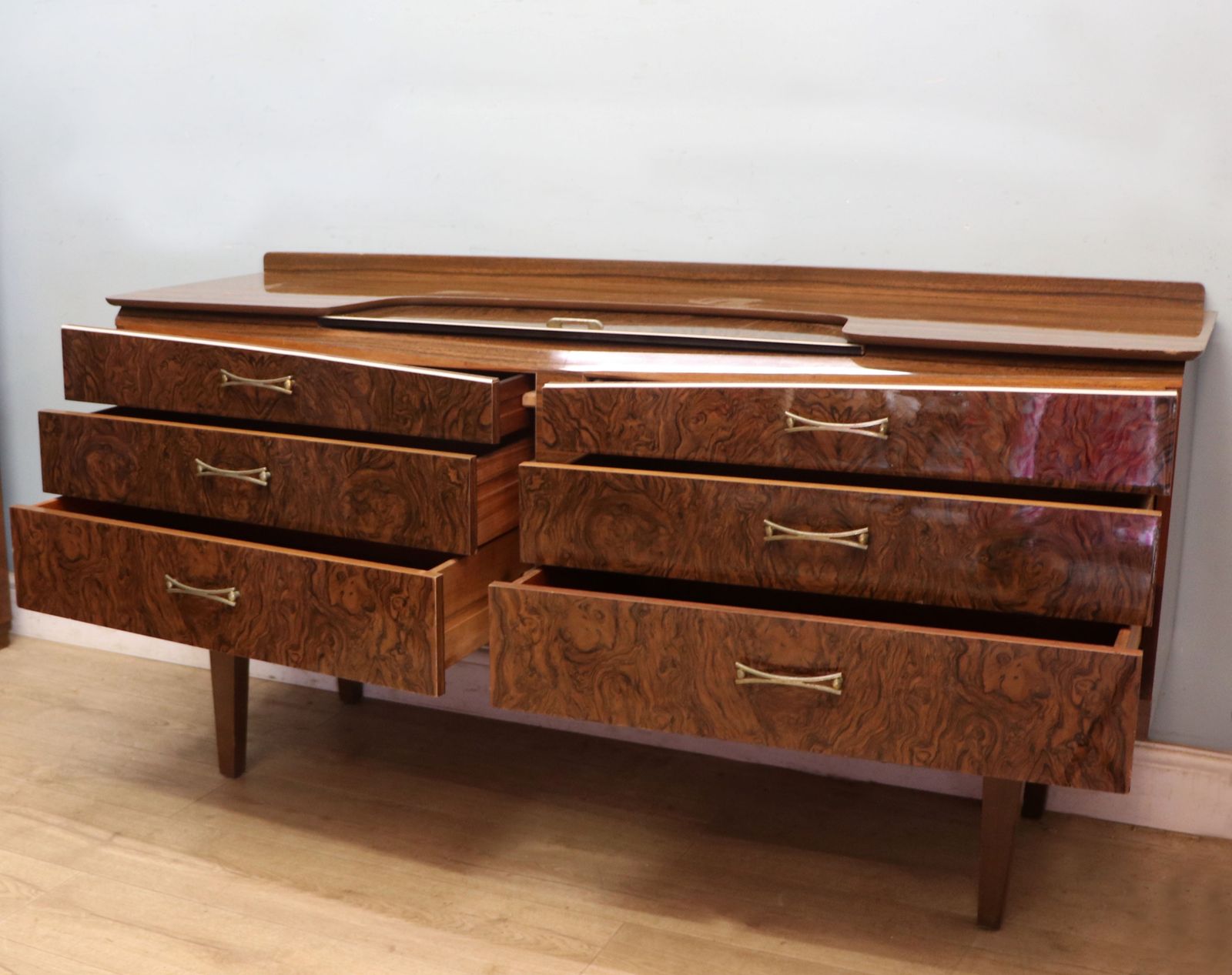 A Super Vintage Mid Century, Wide Chest Of Drawers With A Walnut Effect Melamine Finish. photo vintage