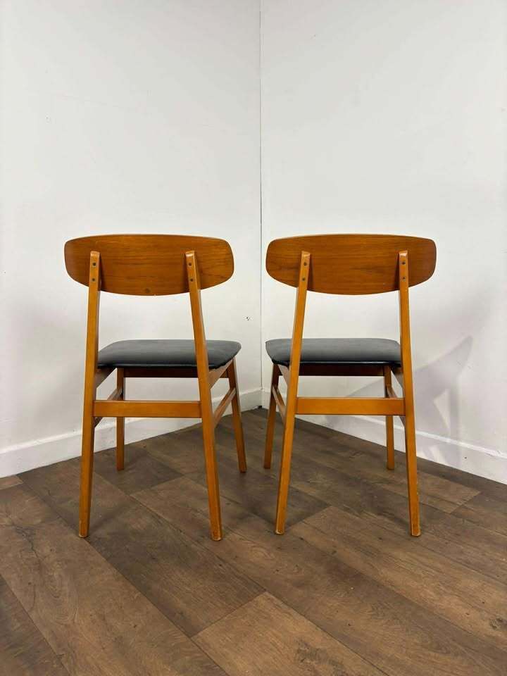 Pair Of Mid Century Teak Chairs With Black Upholstery photo vintage