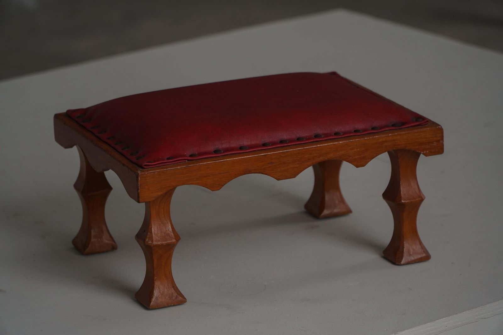 280.0 Danish, Mid 20th Century, Carved Oak Footstool With Red Leather Seat, 1950s photo