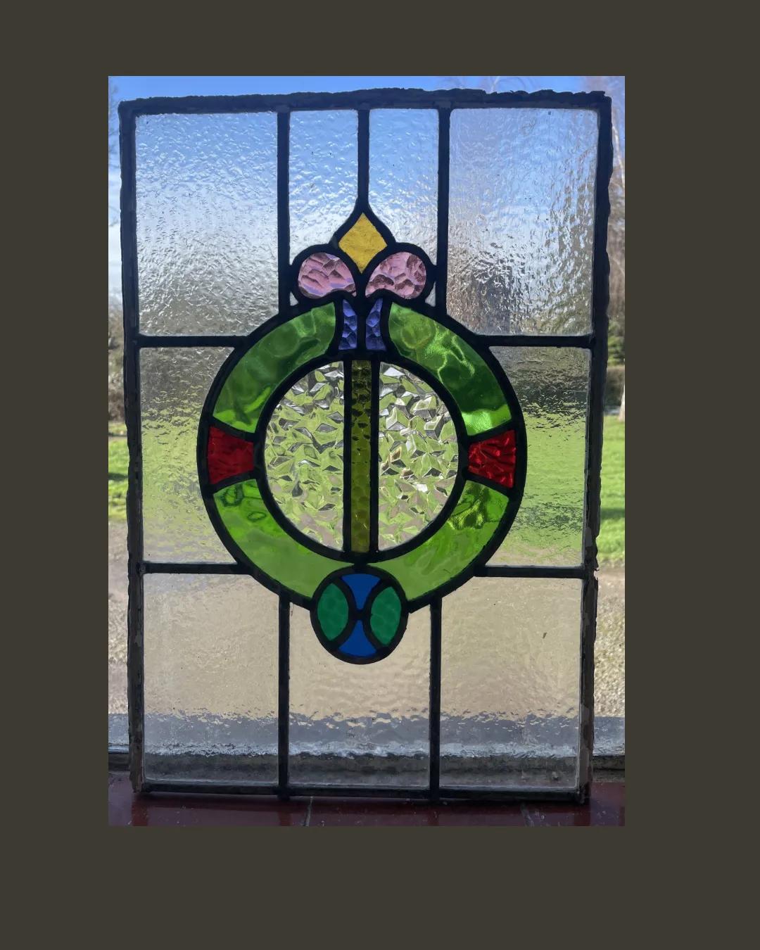 Edwardian Stained Glass Panel With Circular Wreath Motif And Stylised Floral Detail And Textured Glass C.1905