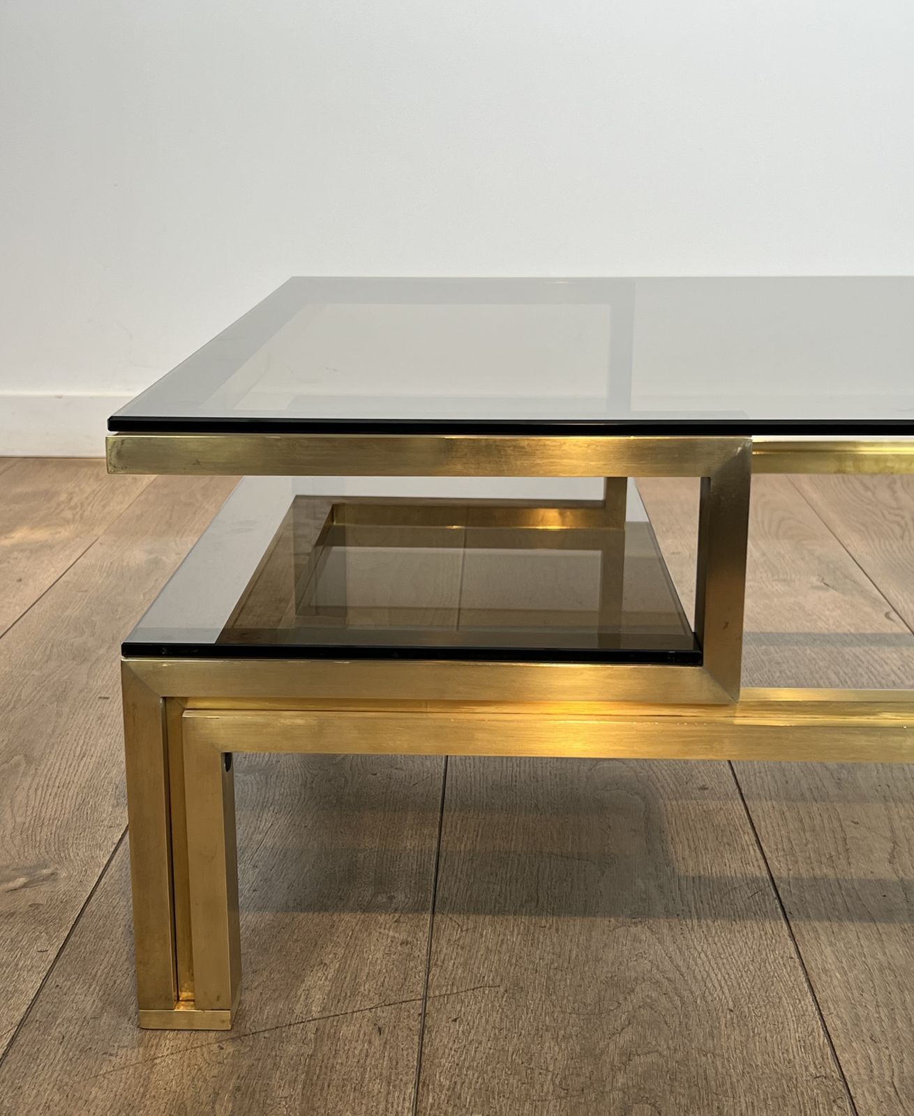 photo furniture Modernist Coffee Table In Brass And Smoked Glass Tops By Guy Lefèvre For Maison Jansen