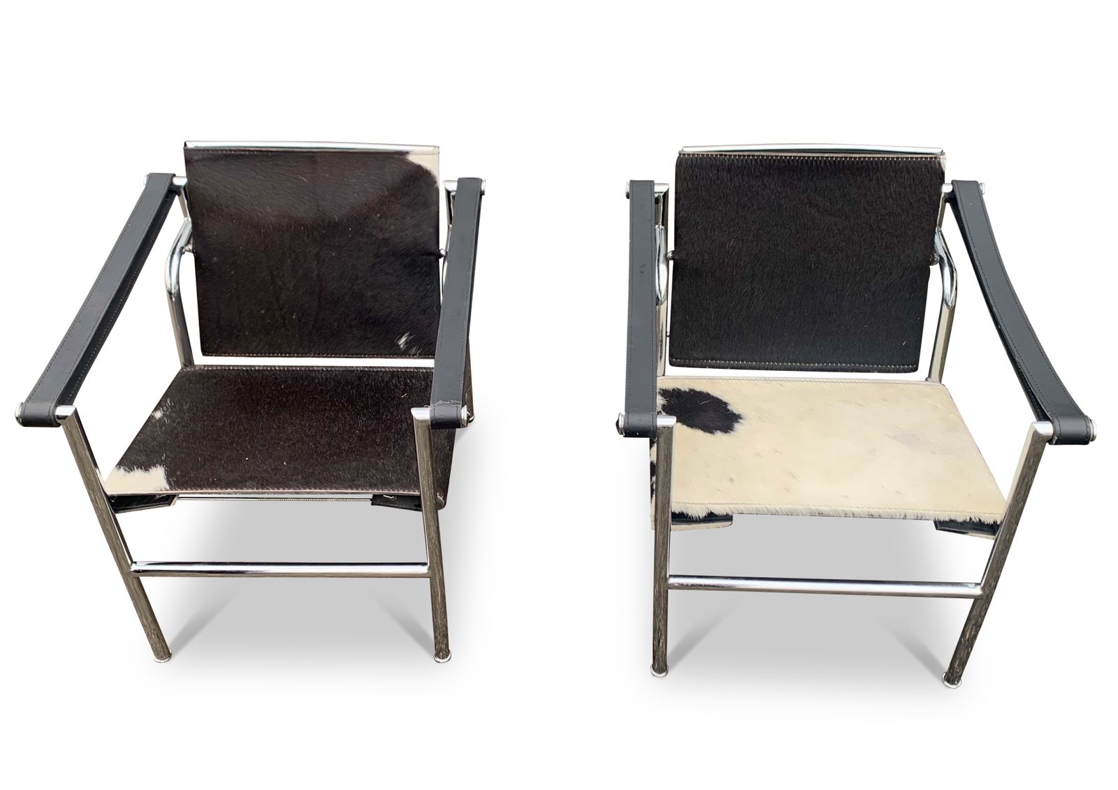 A Pair Of Le Corbusier Style Lc1 Pony Skin Sling Armchairs With Chromed Tubular Frame No Labels Or Markings Circa 1980s/1990s photo for sale