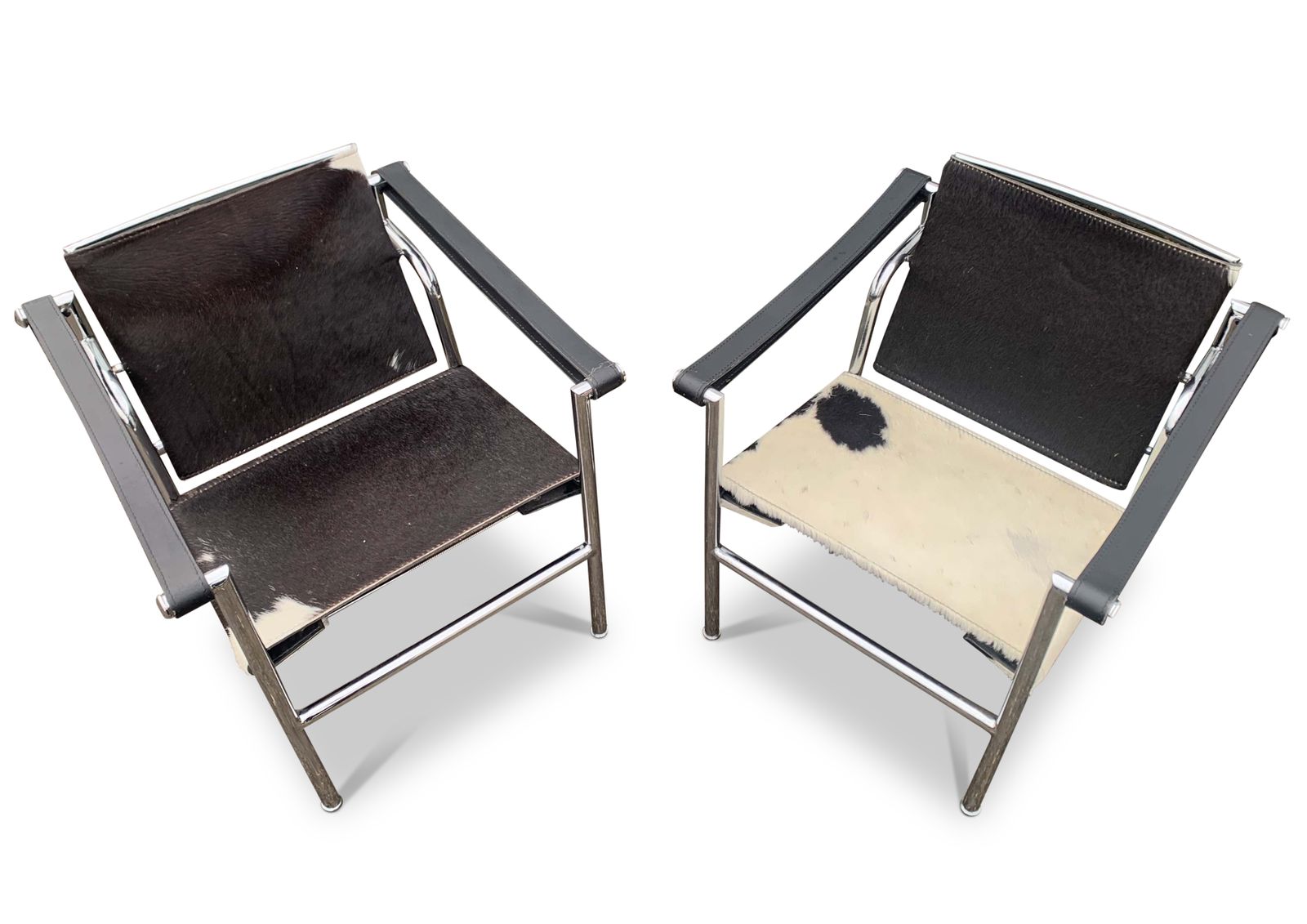 A Pair Of Le Corbusier Style Lc1 Pony Skin Sling Armchairs With Chromed Tubular Frame No Labels Or Markings Circa 1980s/1990s photo buy