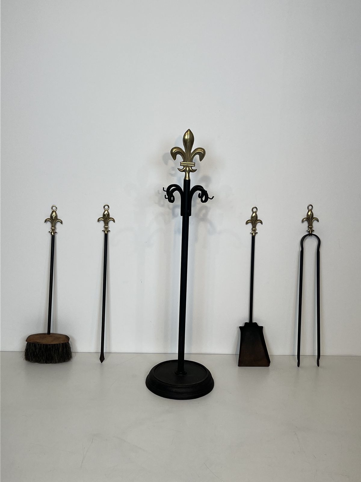 Neoclassical Style Fire Kit In Black Lacquered Metal And Brass With Fleur De Lis Motifs photo Home Fixtures