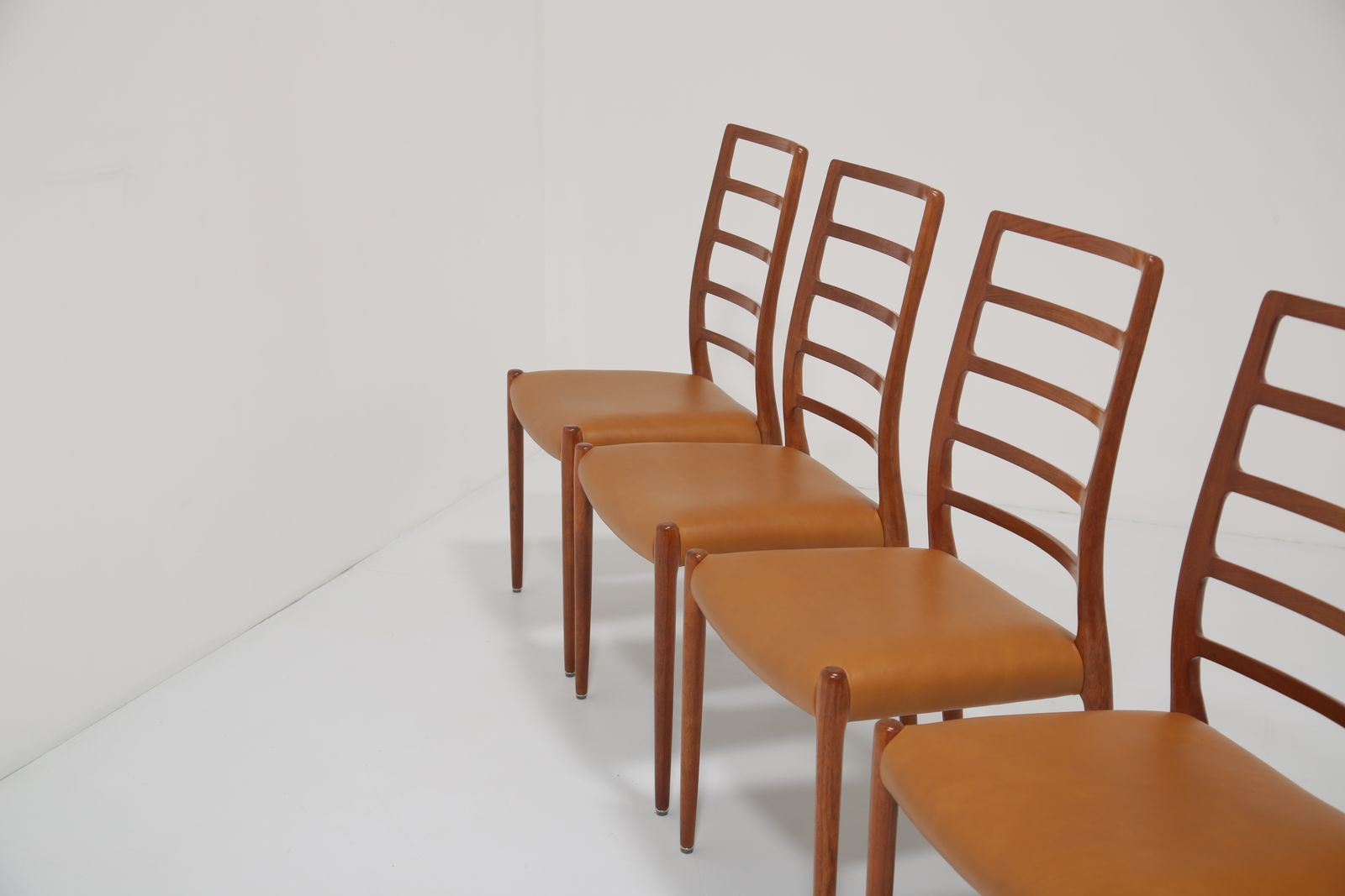 Niels Otto Møller Model 82 Dining Chairs: Set Of 8 In Solid Teak And Tan Leather For J.L. Møllers, 1960s photo for sale