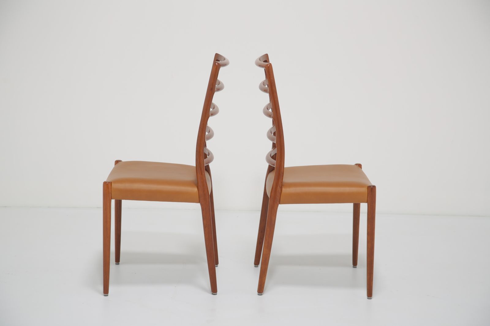 photo buy Niels Otto Møller Model 82 Dining Chairs: Set Of 8 In Solid Teak And Tan Leather For J.L. Møllers, 1960s
