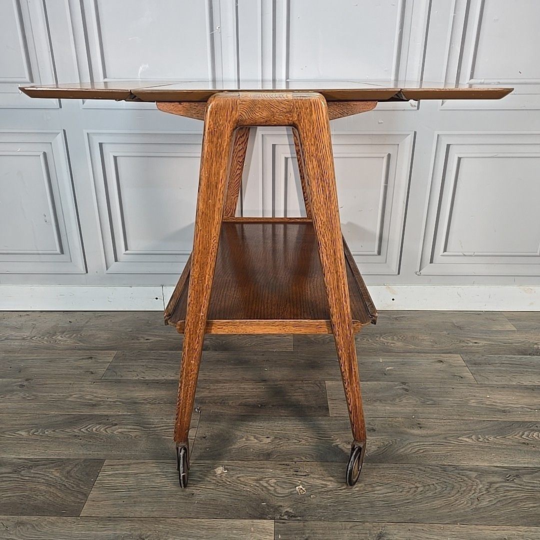 photo vintage Vintage Oak Trolley Table Drop Leaf On Castors Mid Century Modern Wooden Retro