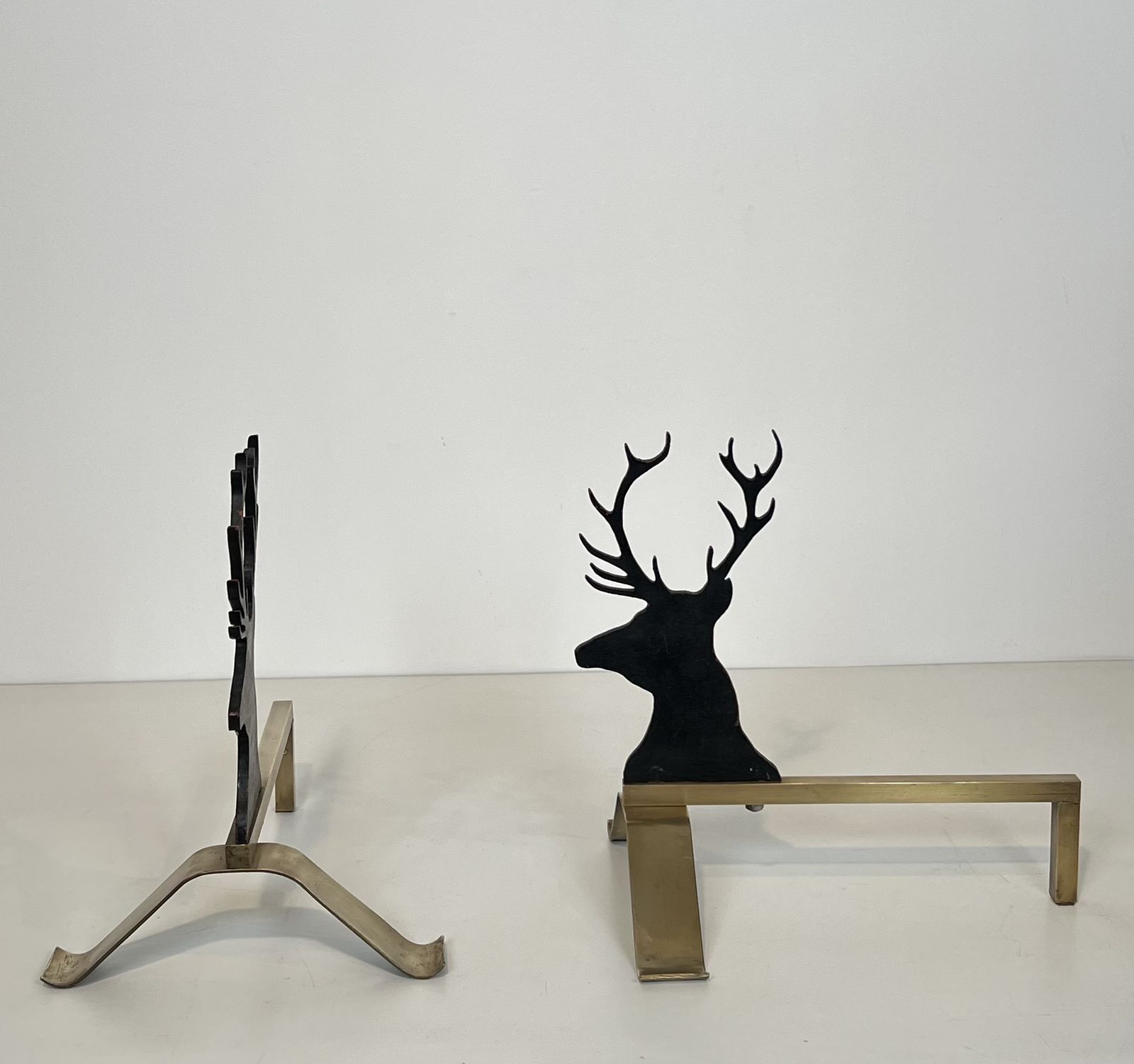 Pair Of Stag Andirons In Black Lacquered Steel And Brass photo Home Fixtures