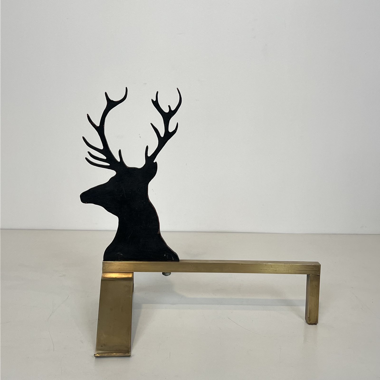 Pair Of Stag Andirons In Black Lacquered Steel And Brass photo vintage