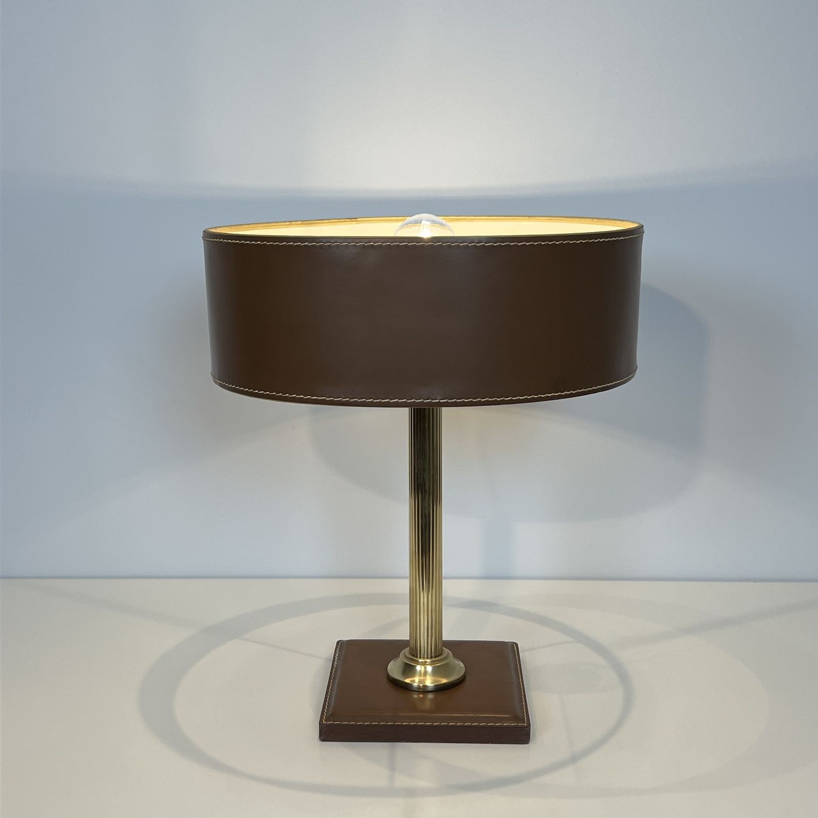 Brown Leather And Brass Desk Lamp In The Style Of Jacques Adnet photo for sale