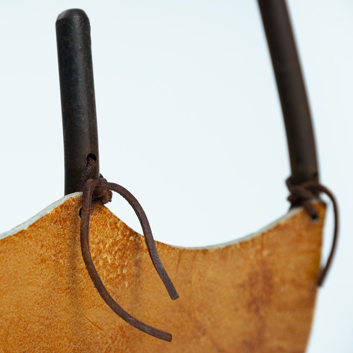 photo furniture Leather And Steel Log Basket In Black Steel And Tan Leather With Asymmetric Handles, Spain, 1960s