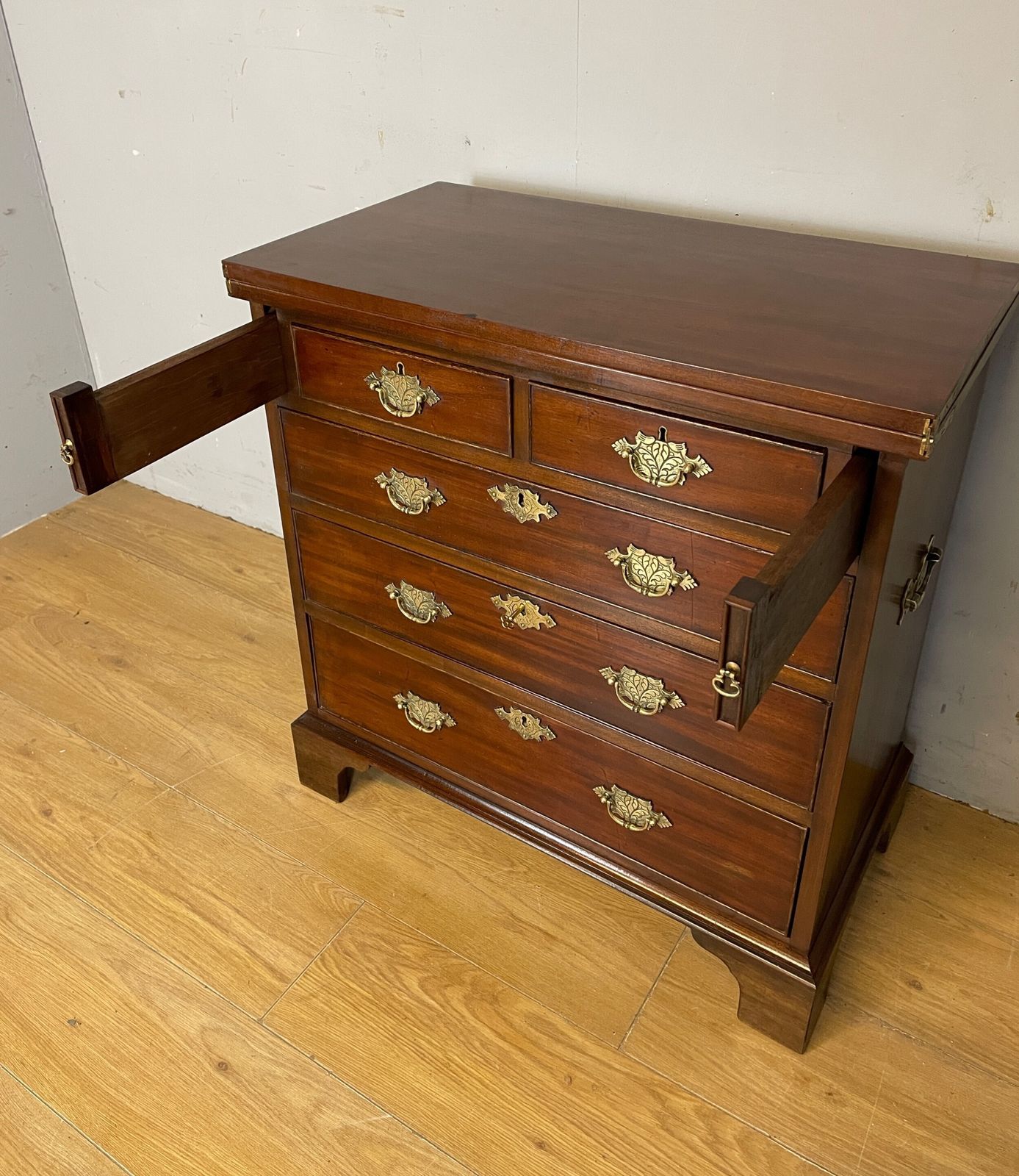 photo for sale C19th Small Mahogany Bachelors Chest On Bracket Feet