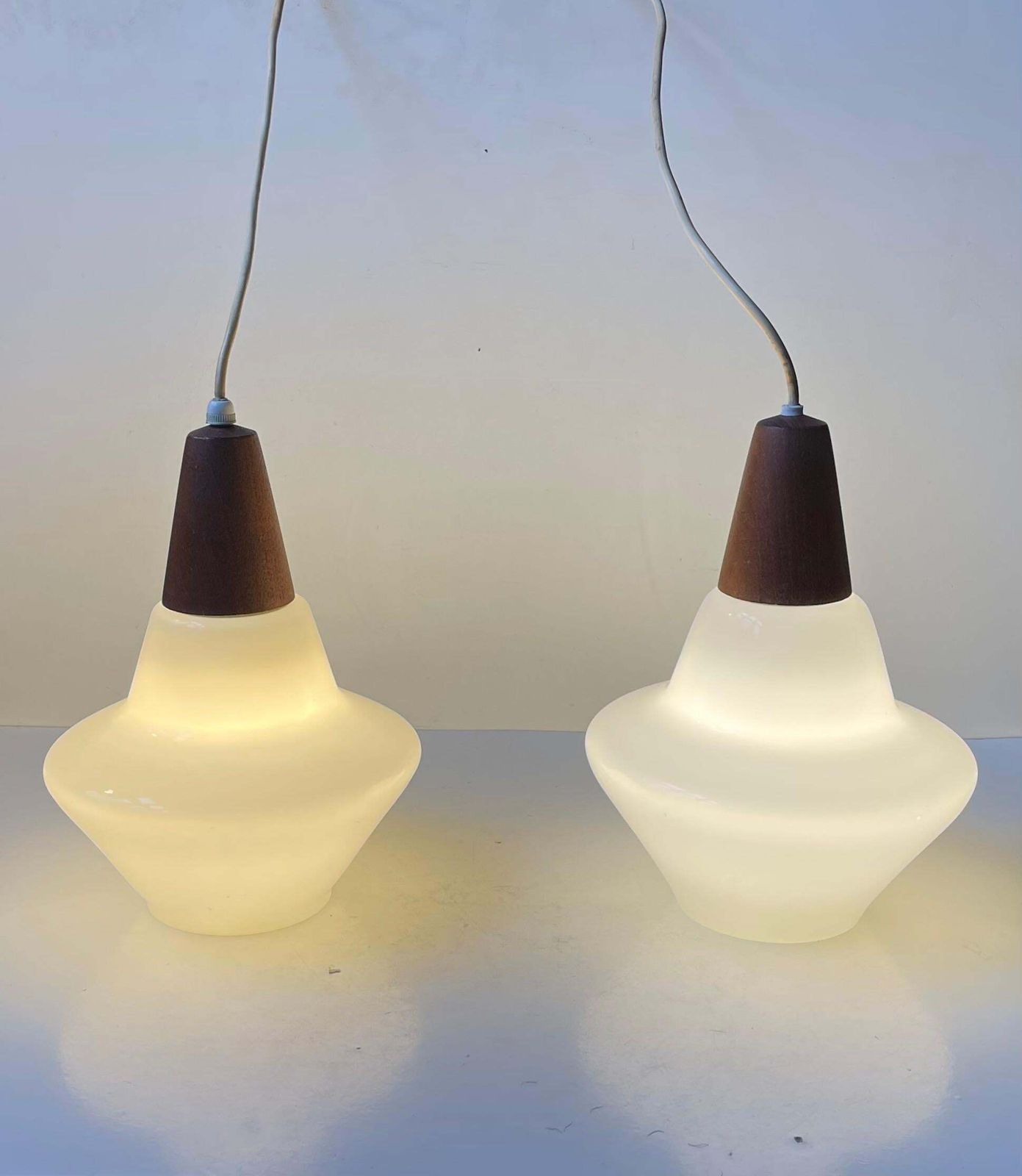 photo for sale Danish Modern White Opaline Glass & Teak Pendant Lamps By Holmegaard, 1960s