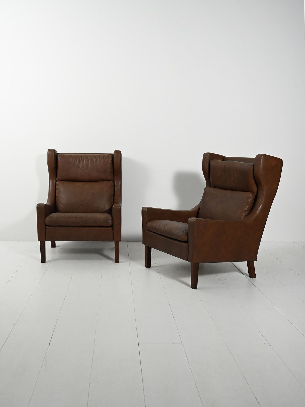 Pair Of Danish Armchairs In Dark Brown Leather photo furniture