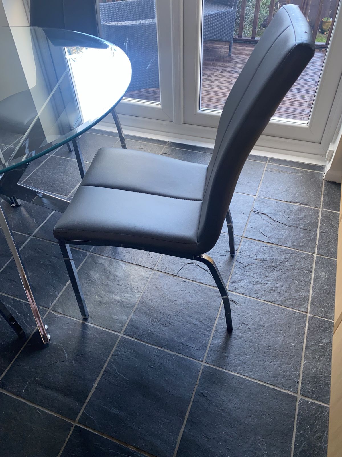Round Glass And Chrome Table And 4 Grey Faux Leather And Chrome Chairs photo for sale