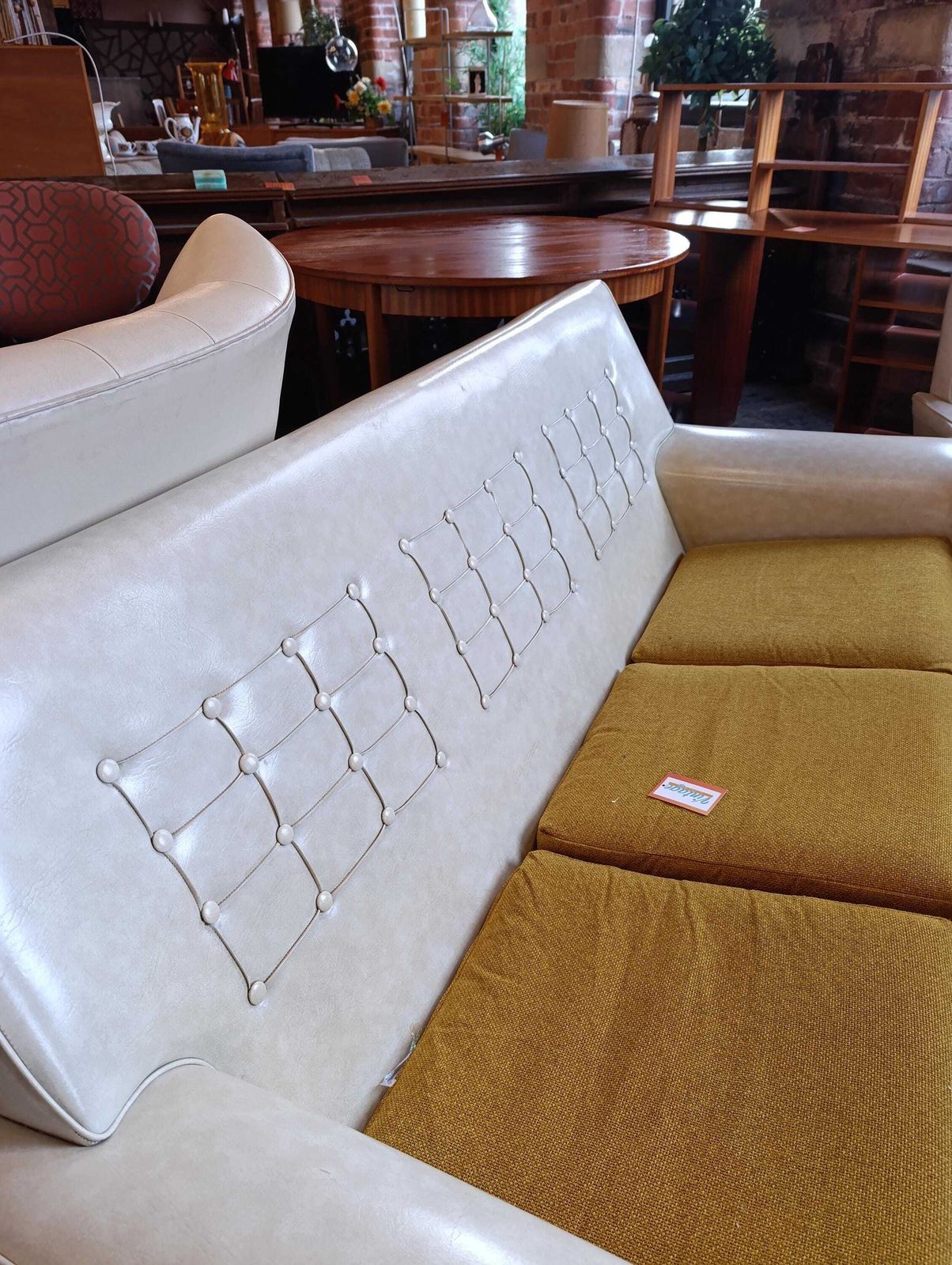 Mid Century Three Piece Lounge Suite In Off White Vinyl With Mustard Cushions photo vintage