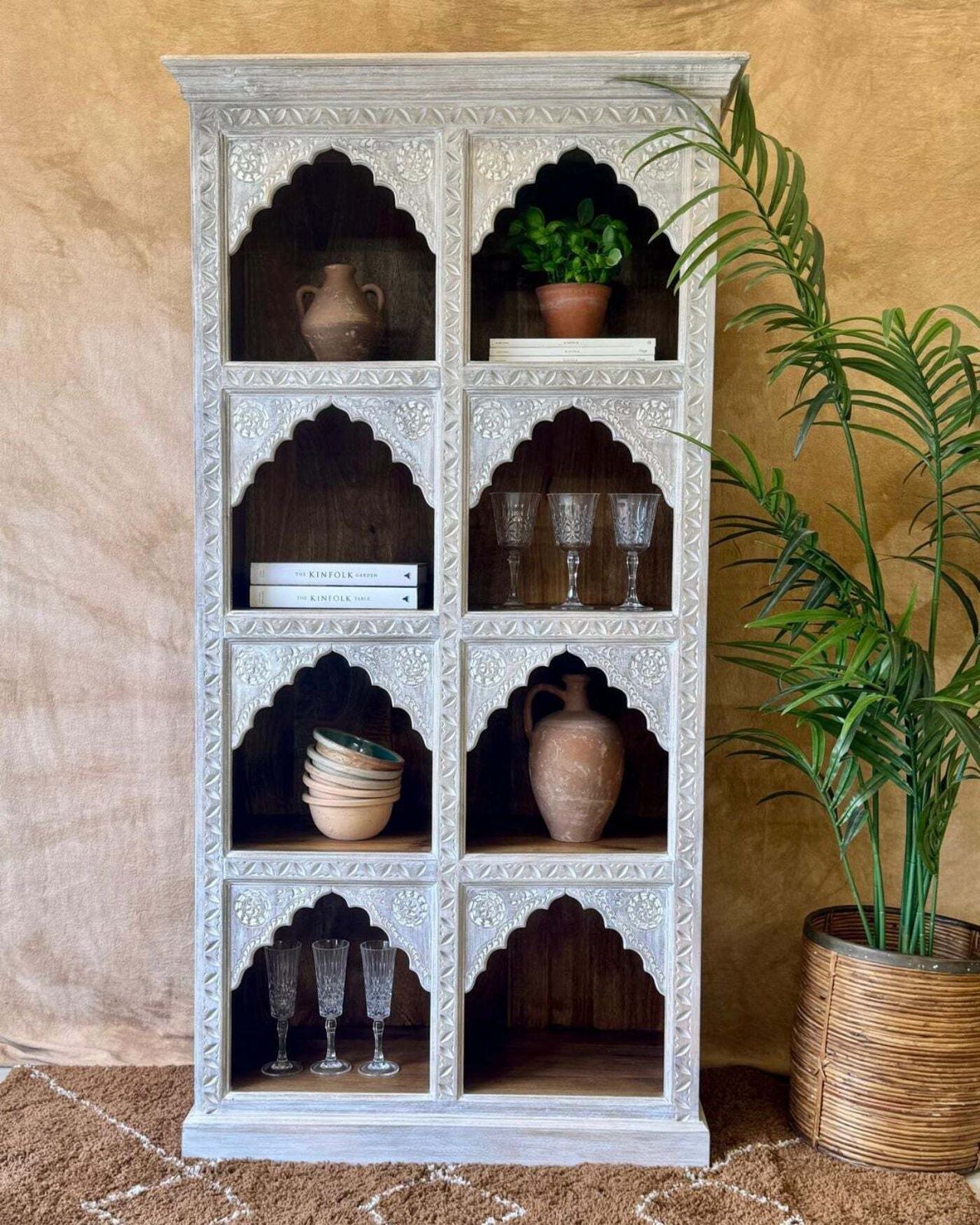 Hand Carved Mango Wood Bookcase With A Light Natural Cream Washed Finish And Arched Shelves