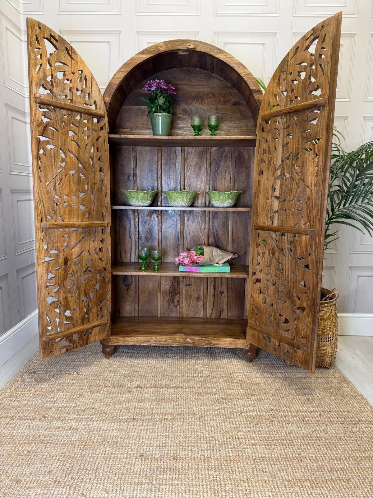 Arched Wardrobe Made Of Hand Carved Mango Wood With Openwork Floral Design In A Natural Finish. photo furniture