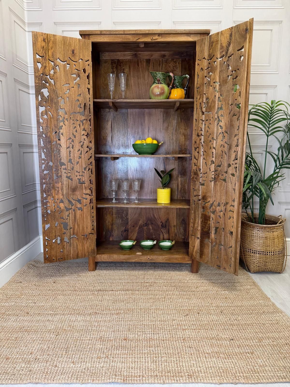 Hand Carved Mango Wood Cabinet With Peacock And Flower Design In A Natural Finish. photo furniture