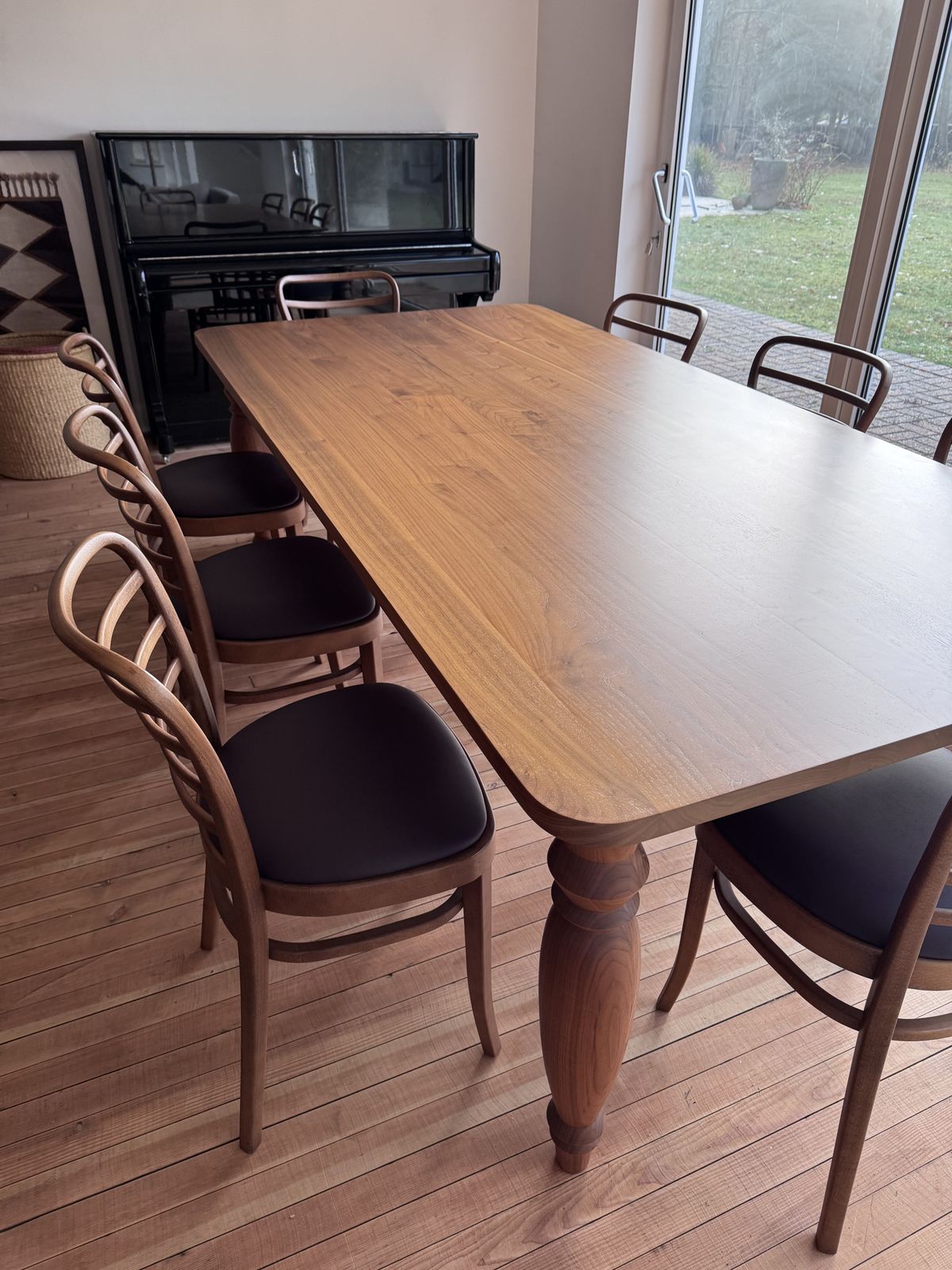 Benchmark Mrs B Dining Table In Walnut Designed By Russel Pinch With 8 Leather Upholstered Vienna Dining Chairs photo furniture