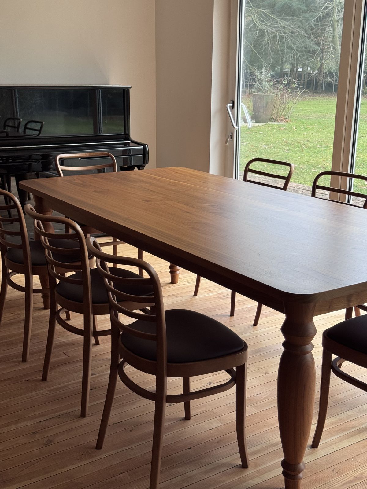 Benchmark Mrs B Dining Table In Walnut Designed By Russel Pinch With 8 Leather Upholstered Vienna Dining Chairs photo Furniture