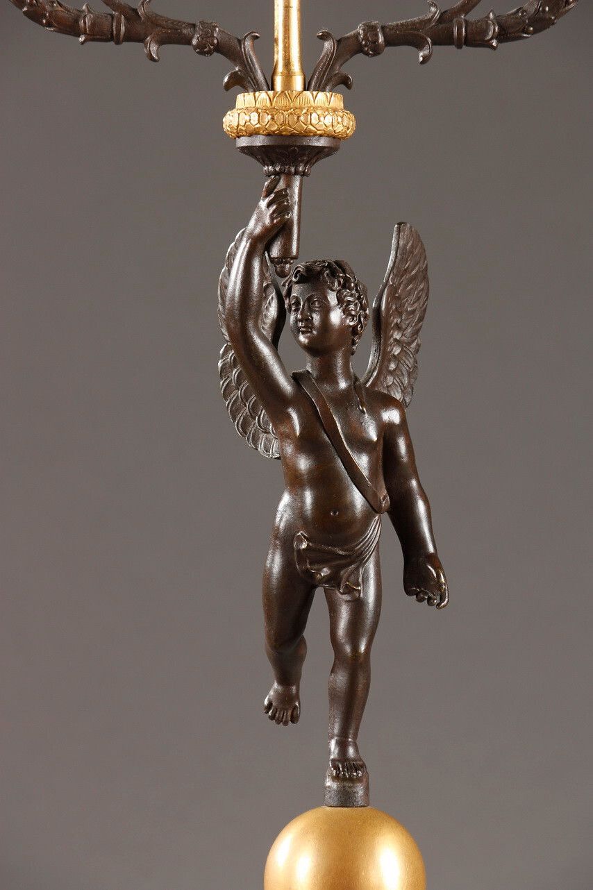 Pair Of Putti Candelabra In Gilt And Patinated Bronze photo for sale