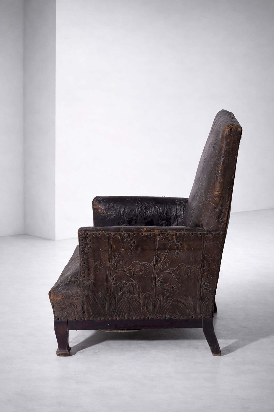 Antique Italian Art Nouveau Leather Armchair With Floral Decorations photo vintage