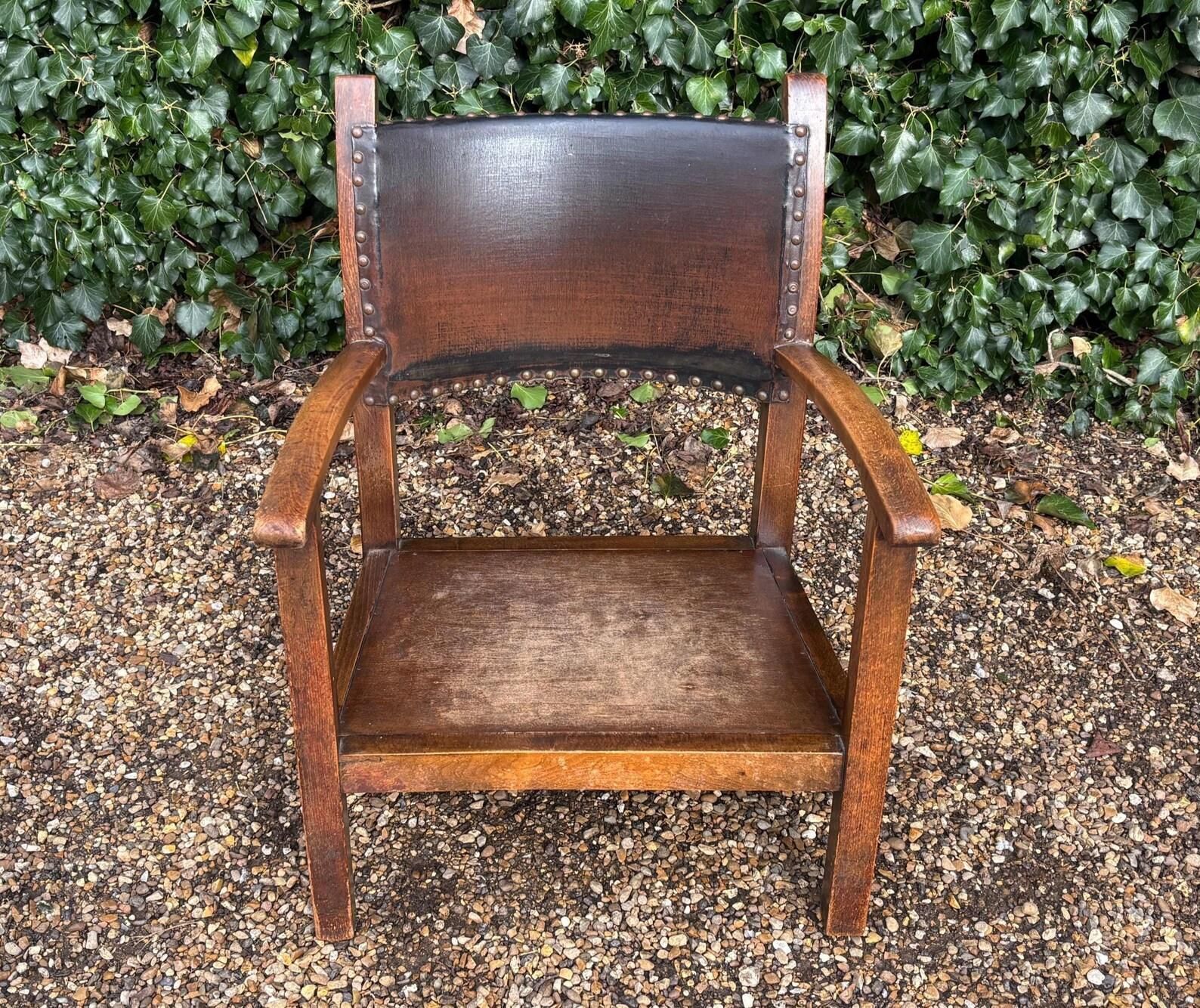 photo furniture Antique Low Oak And Leather Nursing Fireside Elbow Armchair