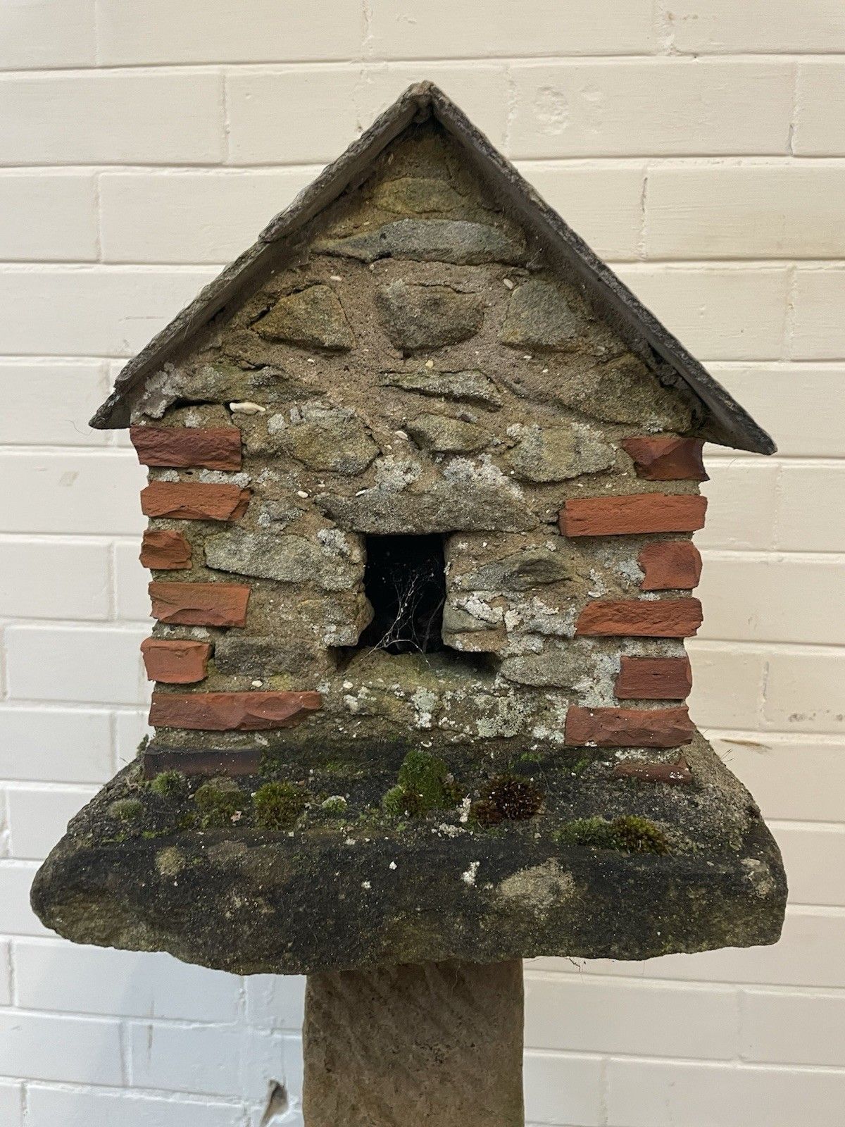 A Charming Folk Art Stone Garden Birdhouse Made From Stone. photo 285.0
