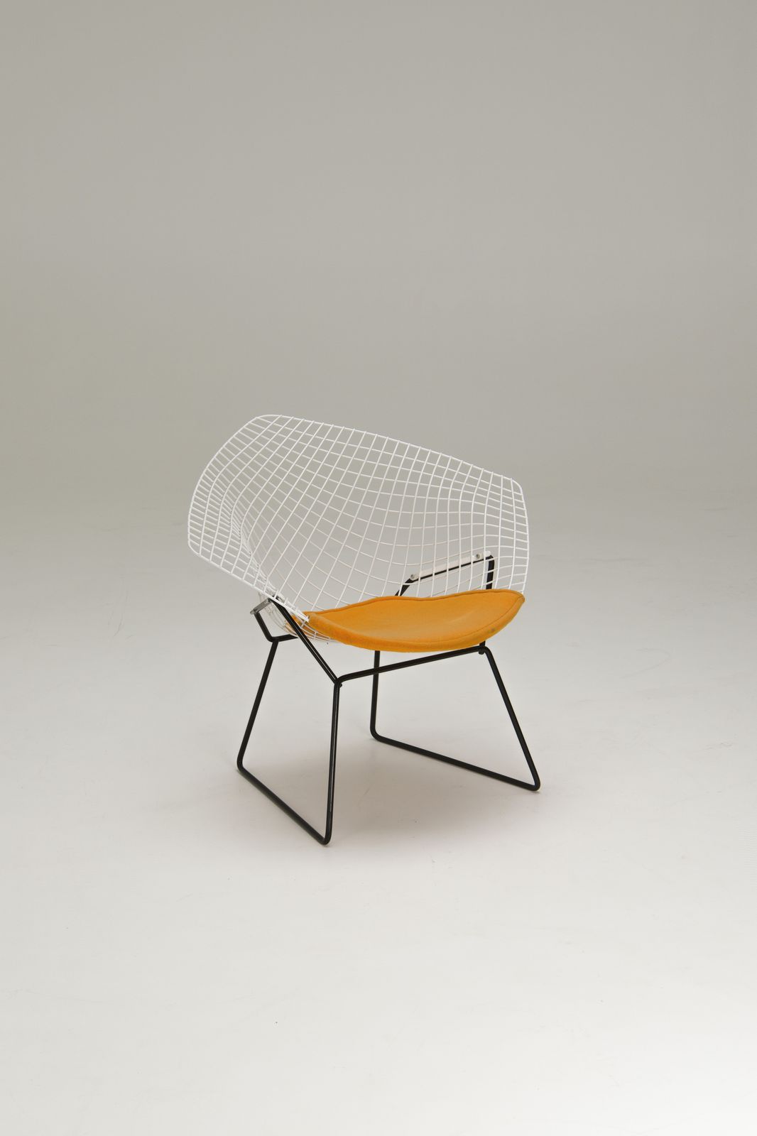 photo furniture Diamond Chair   Yellow Seatpad   Harry Bertoia