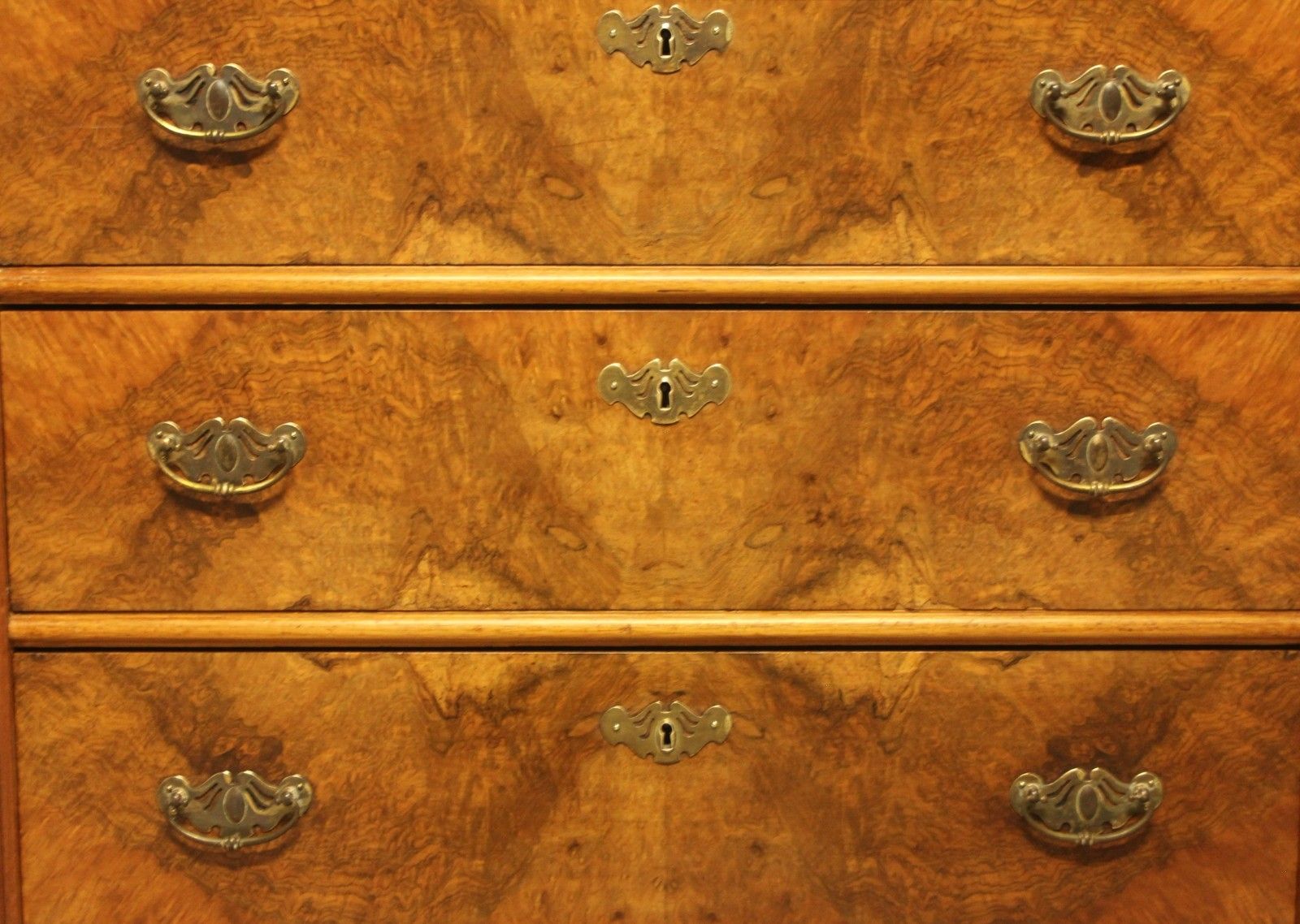 photo furniture A Fine Early 20th‑Century Swedish Burr Walnut Chest Of Drawers