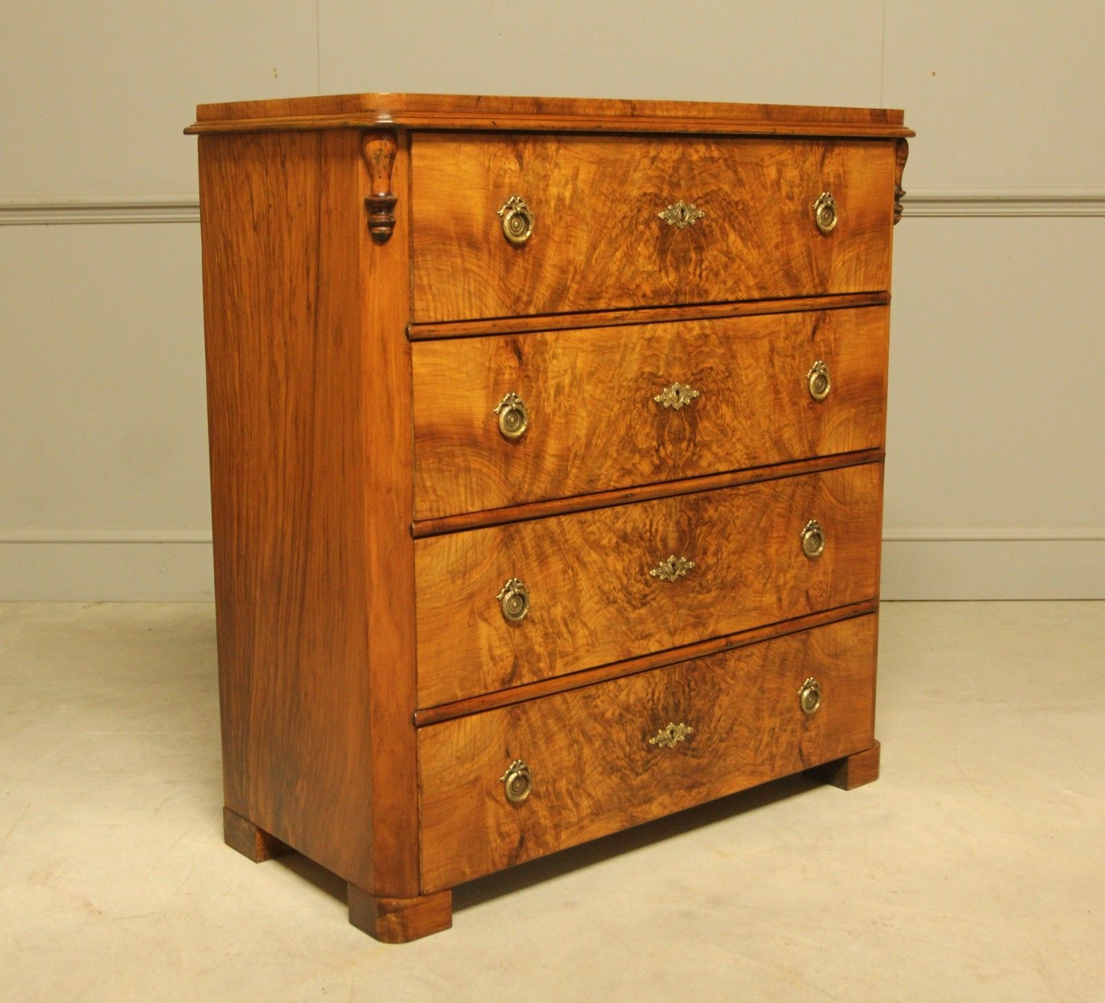 A Late 19th‑Century Swedish Burr Walnut Chest Of Drawers