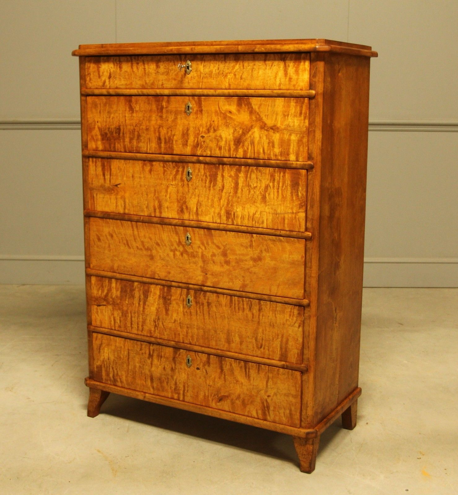 An Early 20th‑Century Swedish Birch Tall Chest Of Drawers photo for sale