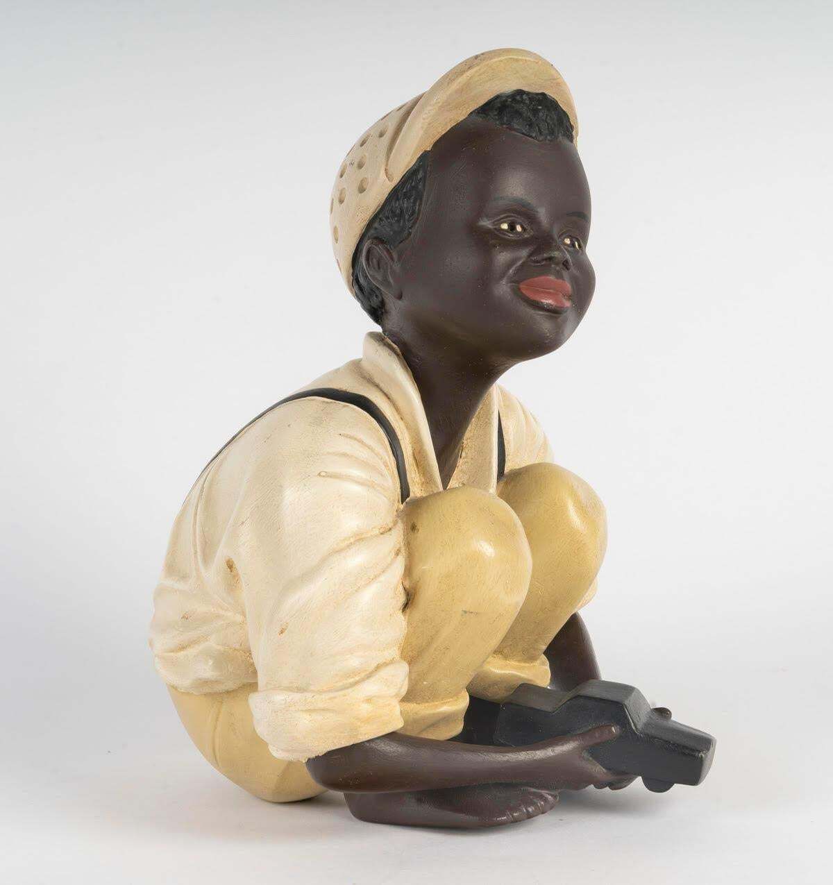 Painted Plaster Sculpture Of A Child Playing, 20th Century. photo furniture