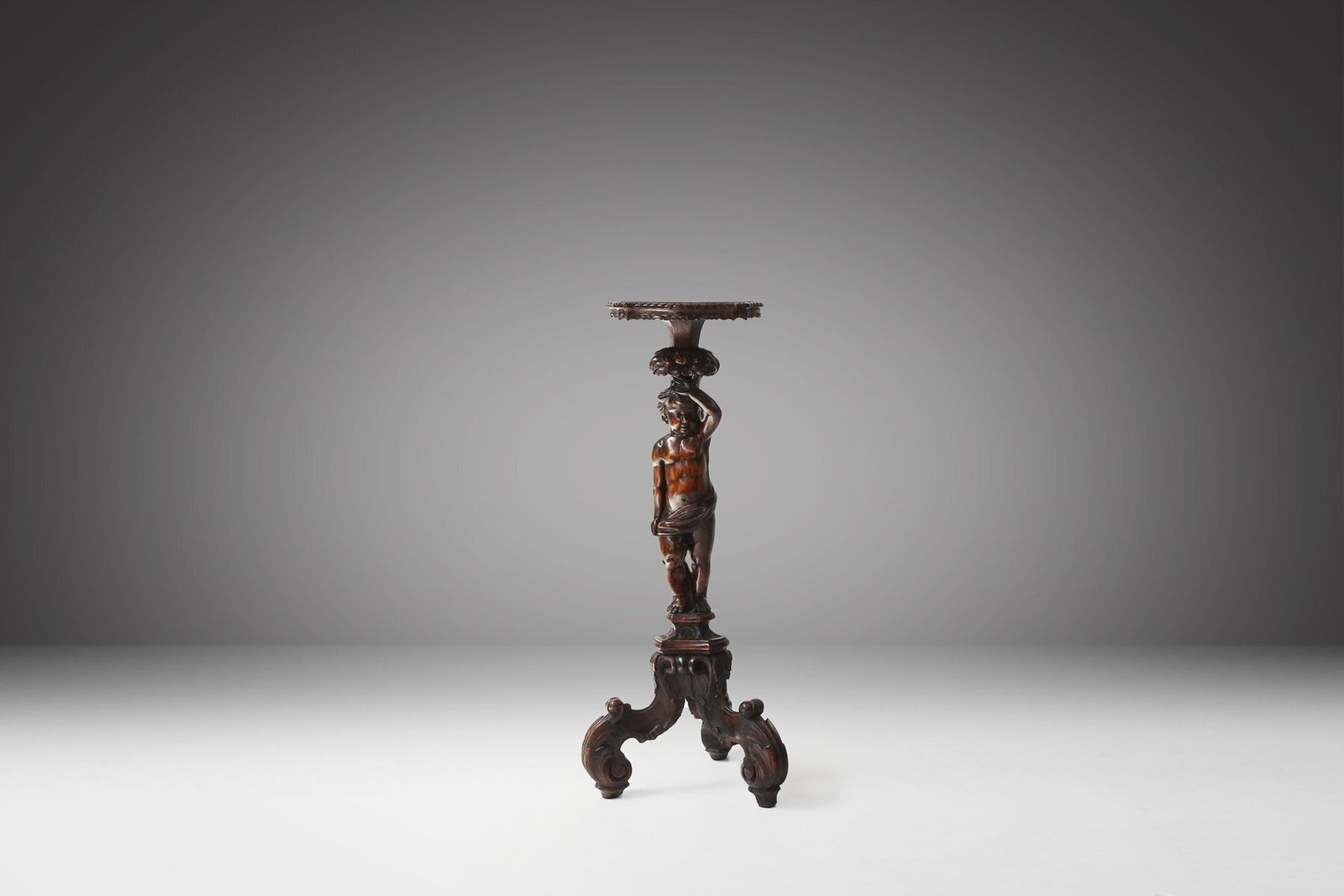 Carved Walnut Pedestal Table With Putto, France, 1850s